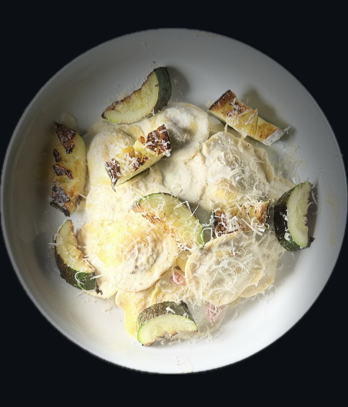 Ravioli with Ricotta Sauce, Roast Zucchini, Lemon, Chilli, Garlic

Roast the zucchini slowly in a pan, take them out when perfect, add sliced chilli, garlic &amp; seasoning into the pan with a drizzle of olive oil, meanwhile the ravioli are poaching.