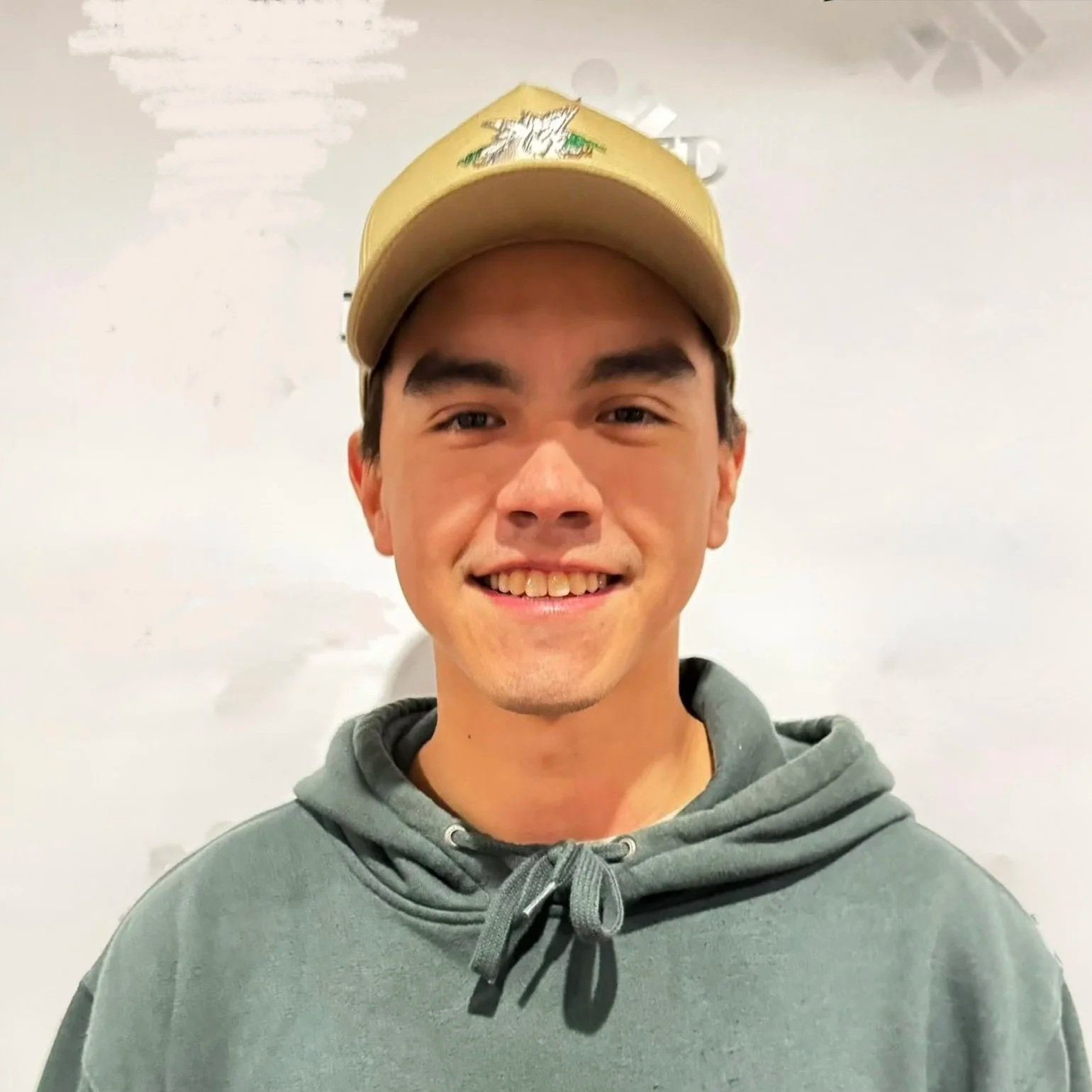 Brent Nahanee serves on the Board of Language Teacher Toolbox, a non-profit society in British Columbia. Brent is pictured wearing a ball cap in front of a grey wall.