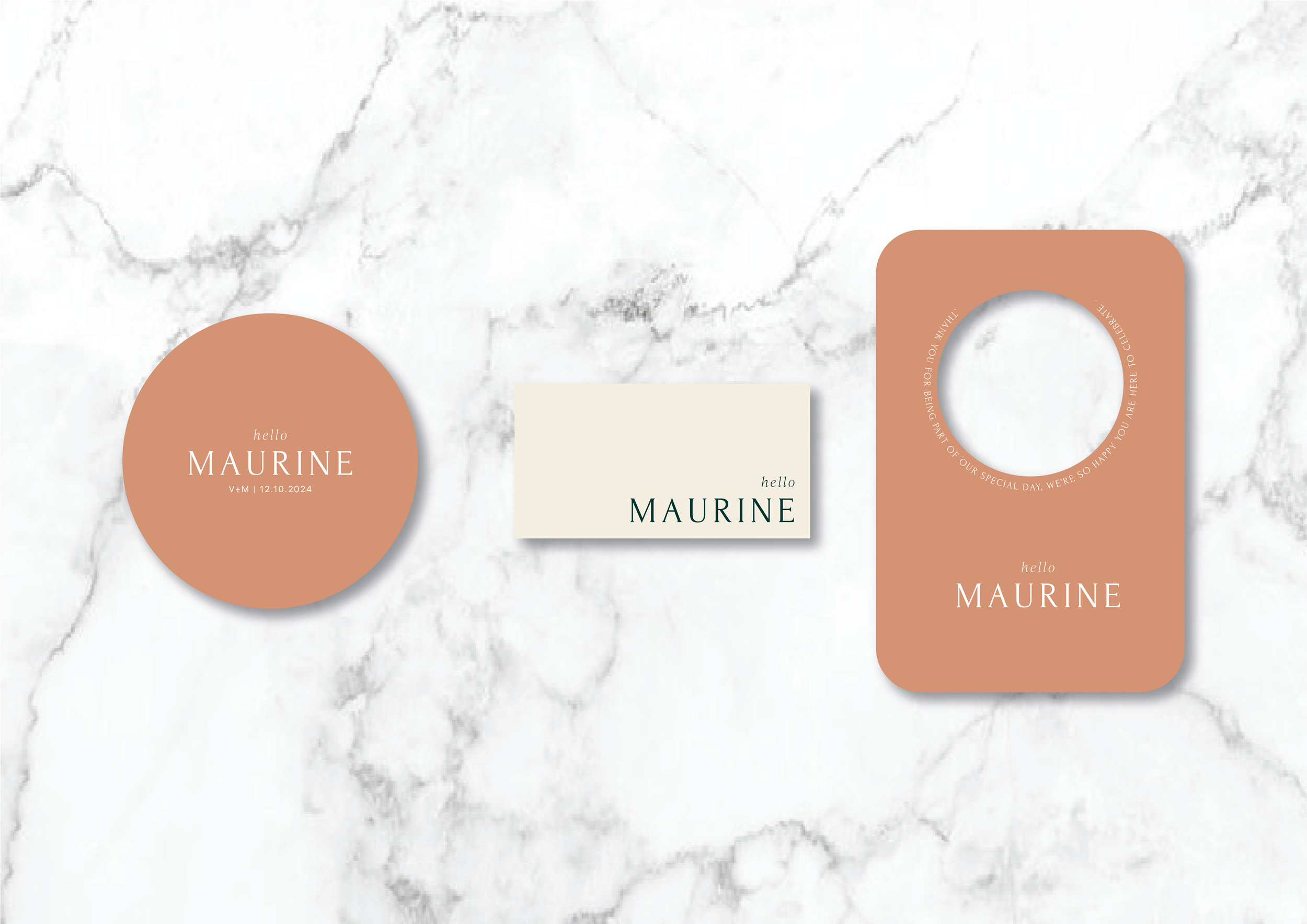 Wedding stationery mockup on a marble background, including a round tag, a rectangular card, and a door hanger, all featuring the name 'Maurine' and a date '12.10.2024'. The colors are earthy tones and cream.