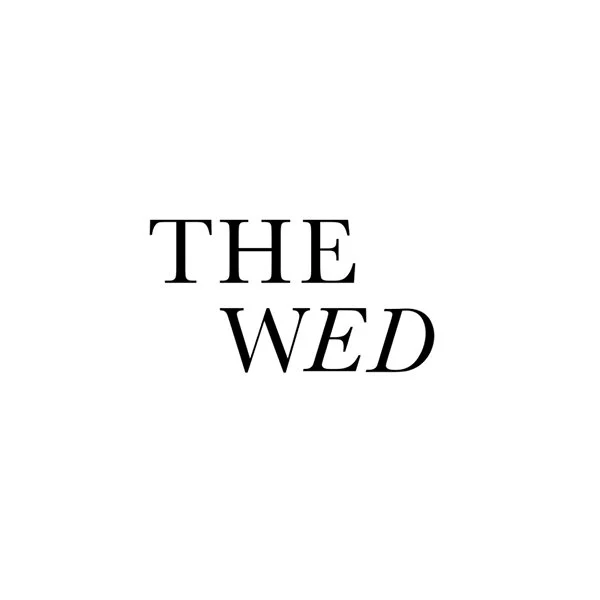 Text that reads 'THE WED' in black on a white background.