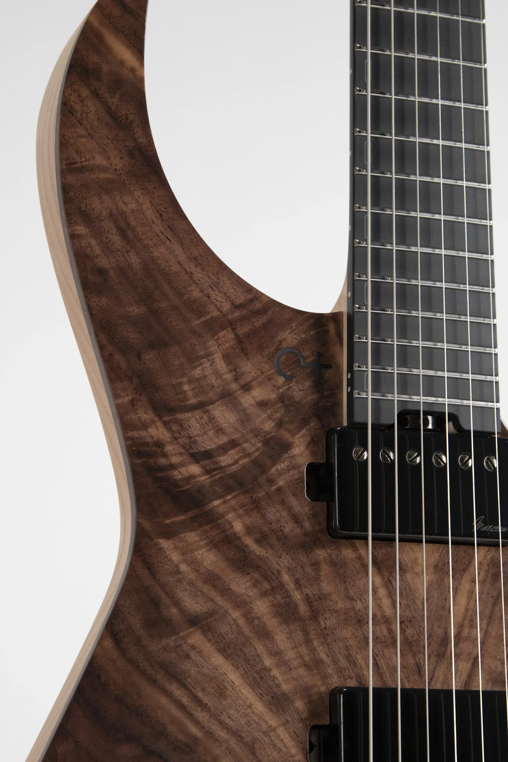 Black Richlite fretboard and pickups of the Infinia Ceres CE3606 6-string guitar