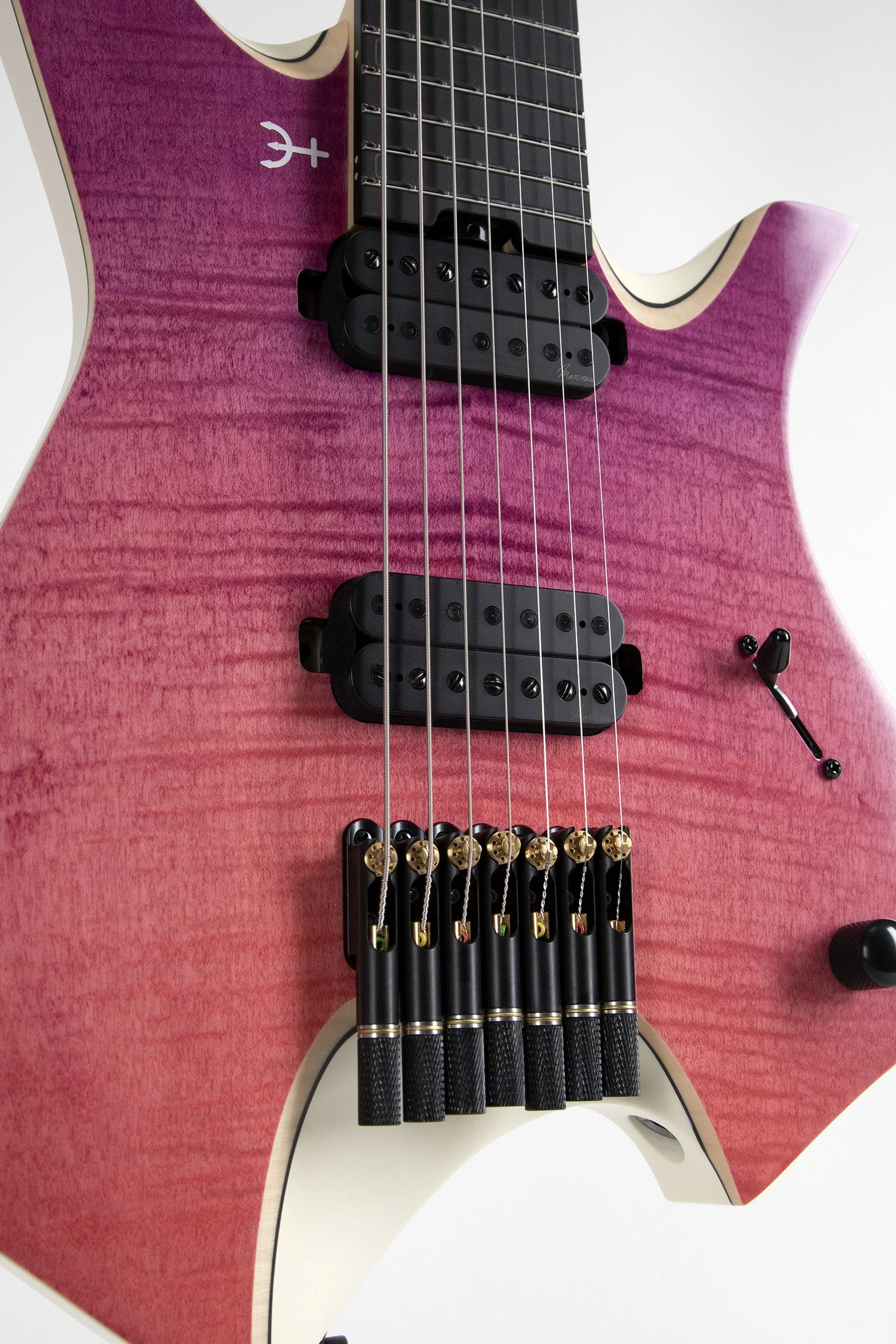 Infinia Neptune NE0606 body detail with black hardware and Icarus and Nautilus pickups, headless bridge