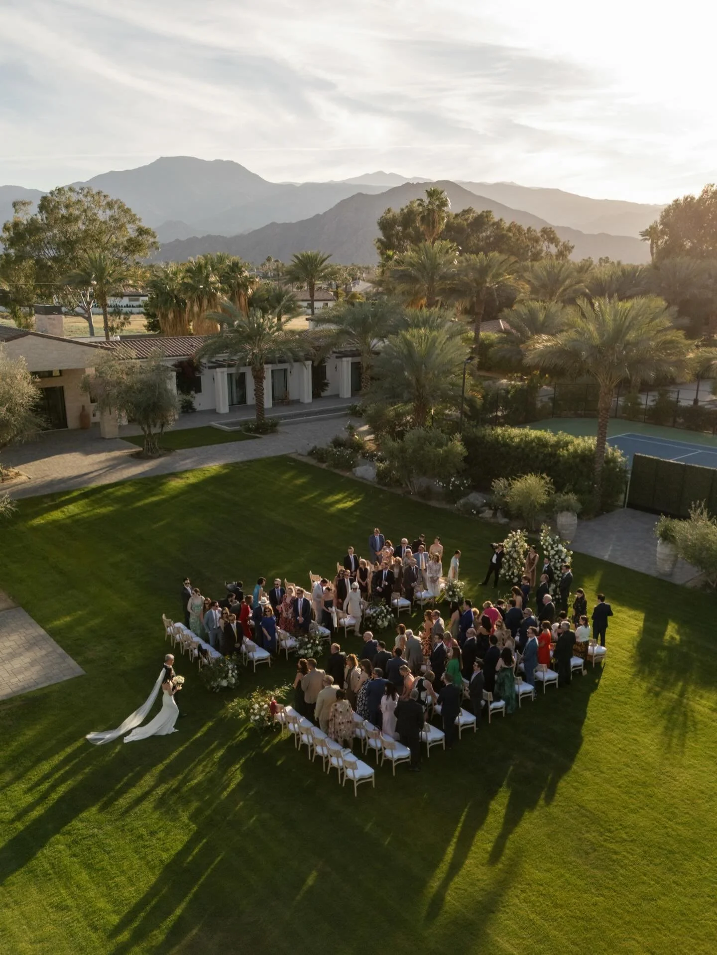 Mountains and shadow for this epic entrance

PLANNING &amp; DESIGN @coj_events
PHOTO @danforthneal of @forma_mgmt
WEDDING VENUE @cache.estate
WELCOME VENUE @ritzcarltonranchomirage
FLORAL @maggiejenseneventflorist
CATERING @furiwa
RENTAL @brightevent