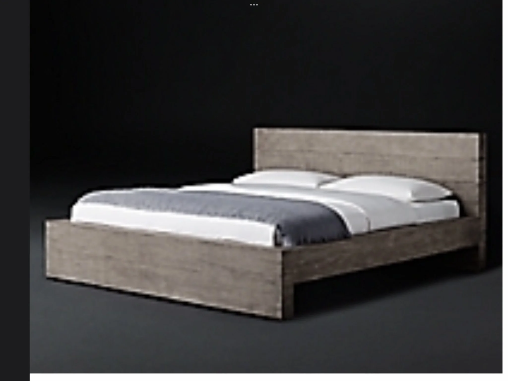 A wooden bed with a gray headboard and frame, decorated with white pillows and a white comforter with a gray blanket, set against a black background.