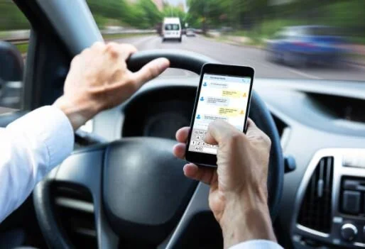 DISTRACTED DRIVING (CELL PHONE USE)