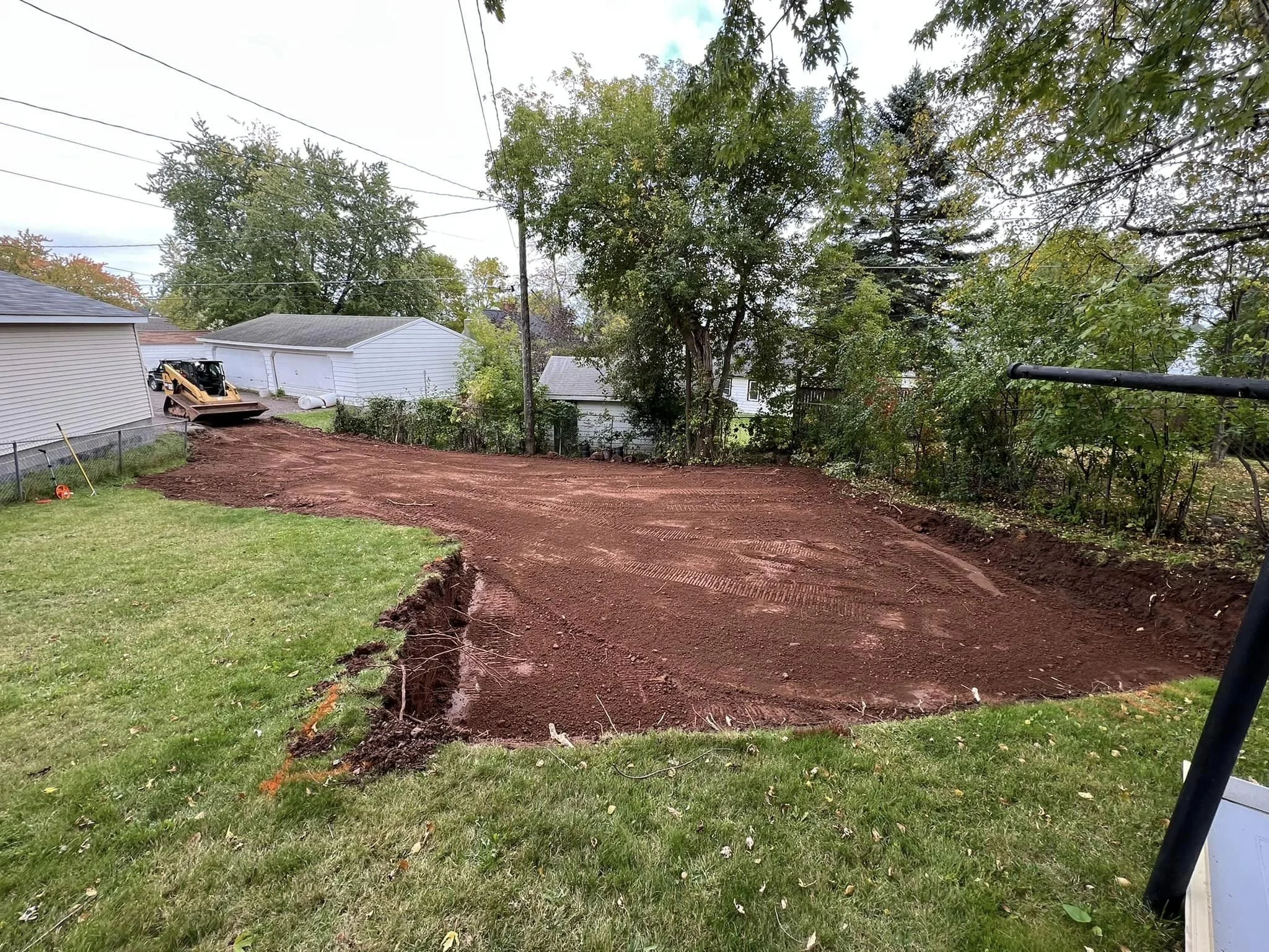New garage pad in central hillside