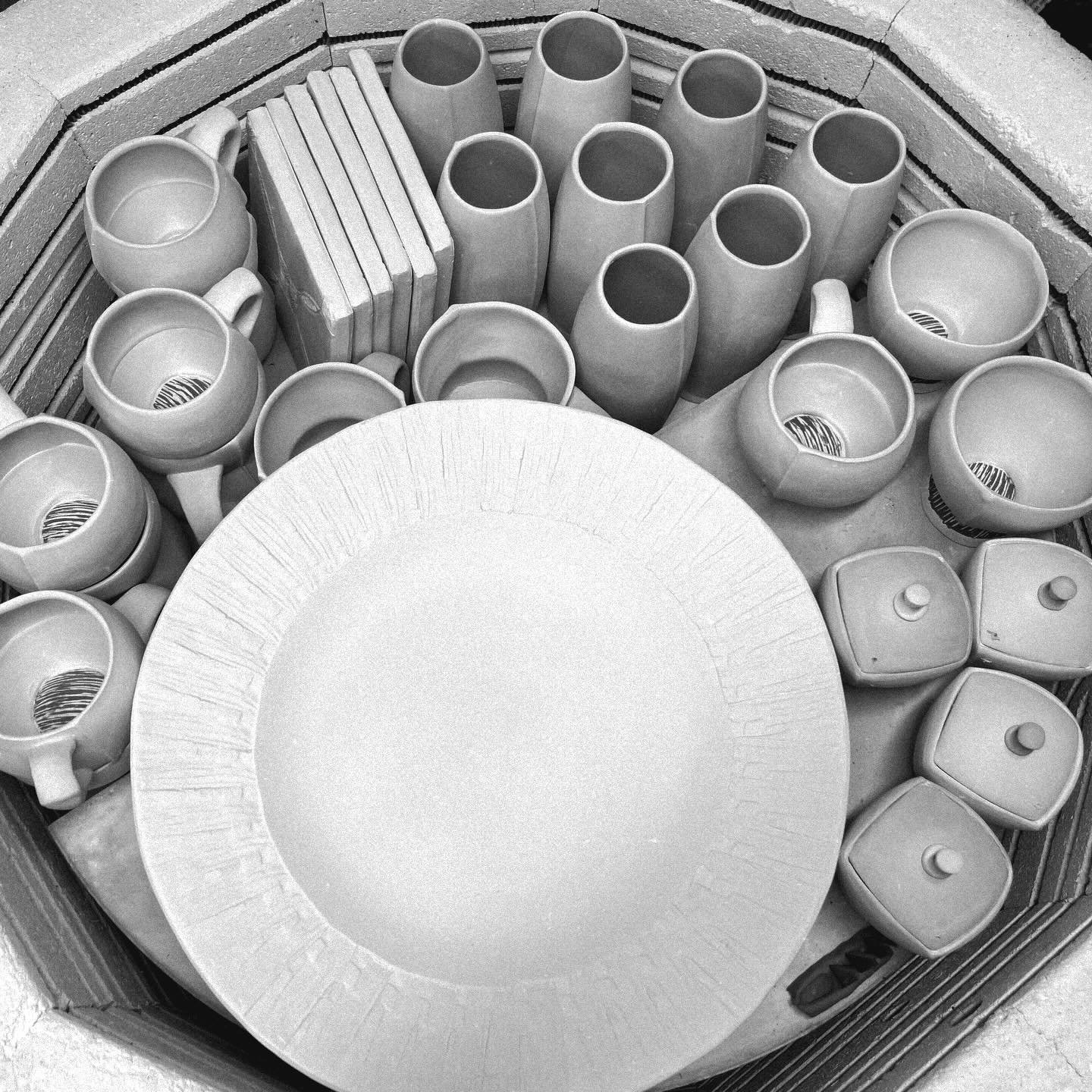 First post this week. I loaded this bisque today.  There&rsquo;s something deeply satisfying about a tightly stacked bisque kiln. This is the gritty filter. I kinda like how it portrays form in the pots. #studio #pottery #filter #cup