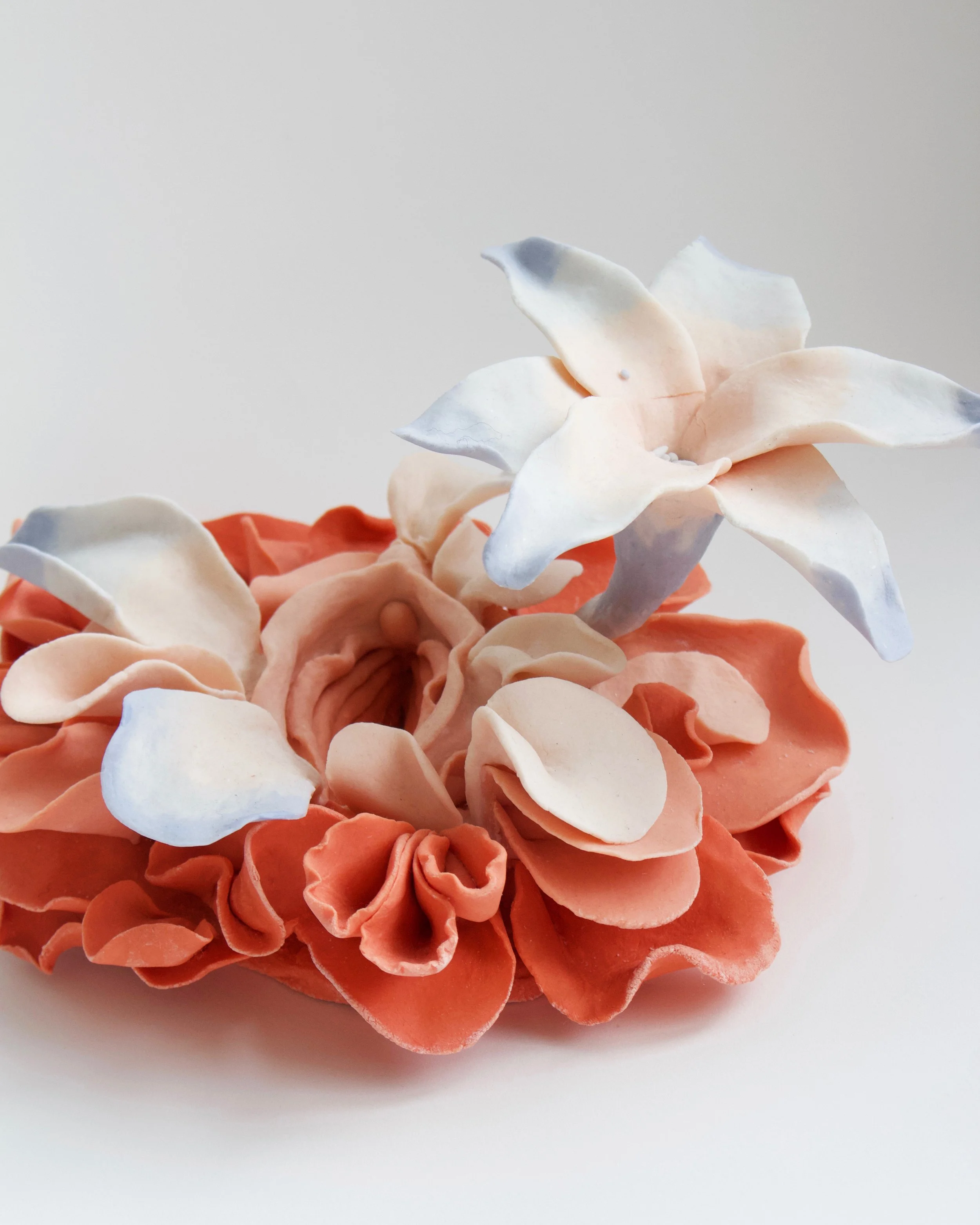bloom, 2022. 
 
Hand-made pigmented paper clay. 
8.5 x 6.5 x 4 inches