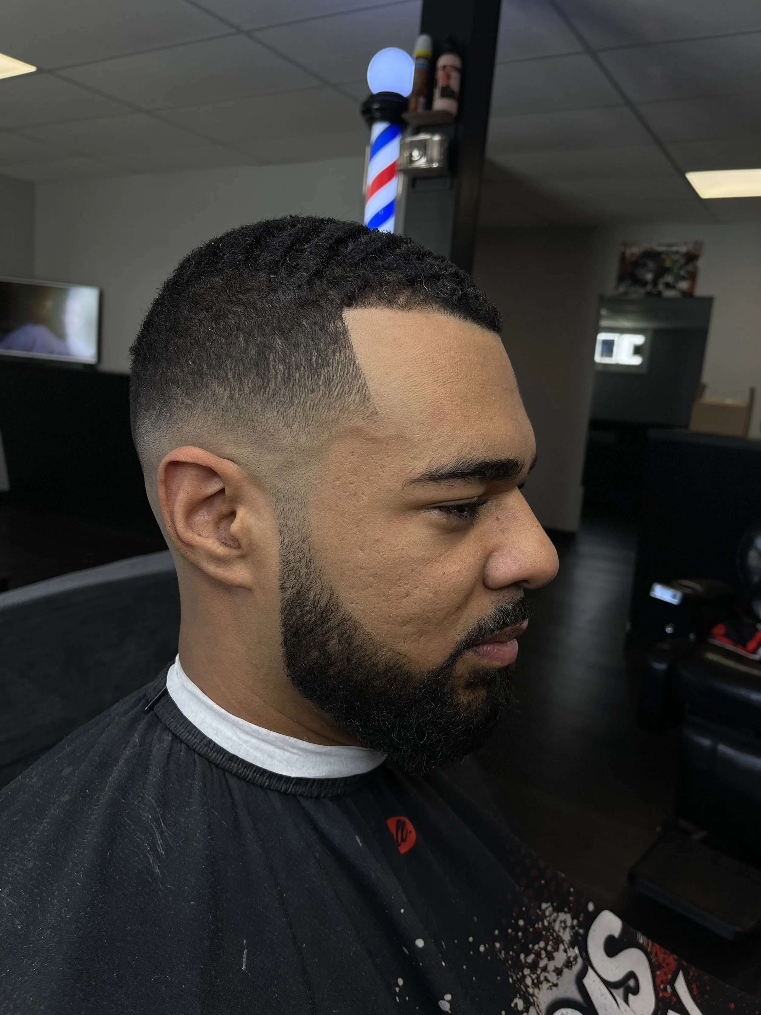 The Hair Den Barbershop