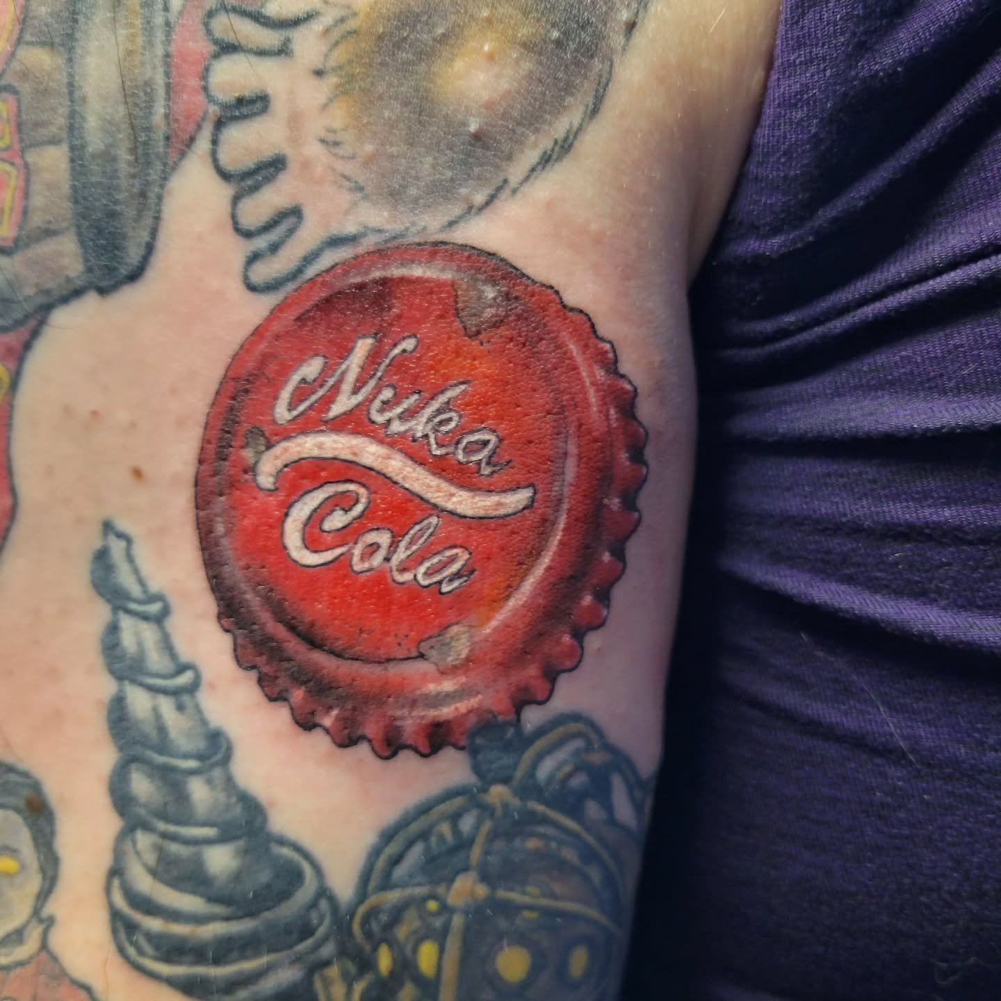 Got to do this fun little Nuka Cola bottle cap today ♡
Always booking at Apothecary Ink
3060 State Hwy 9N, Greenfield Center, NY 12833
Stop at the shop or at my website at www.JulietteTattoos.com
You can text me directly too 518-417-1909
Than