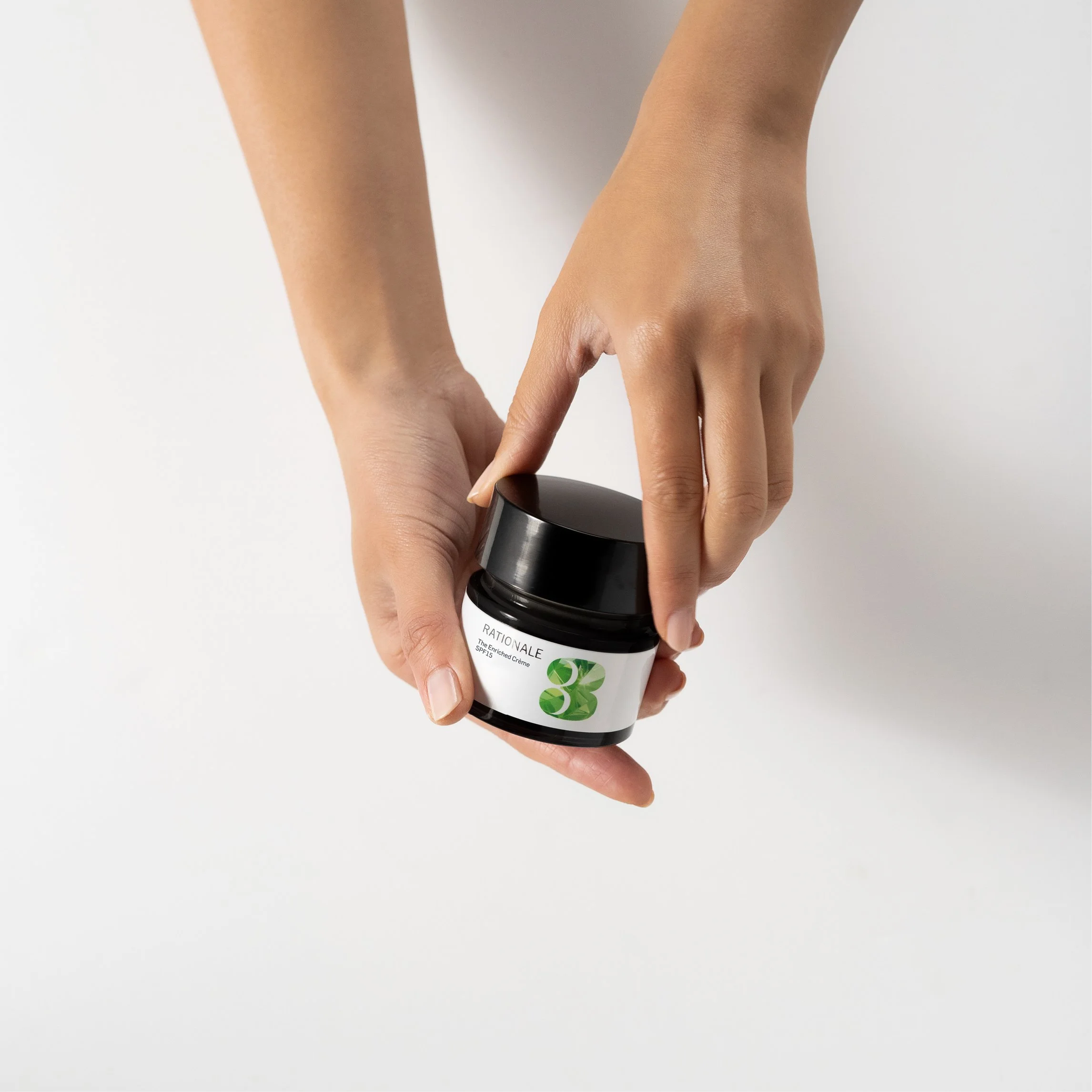 3-ENCRICHED CREME InHand.jpg