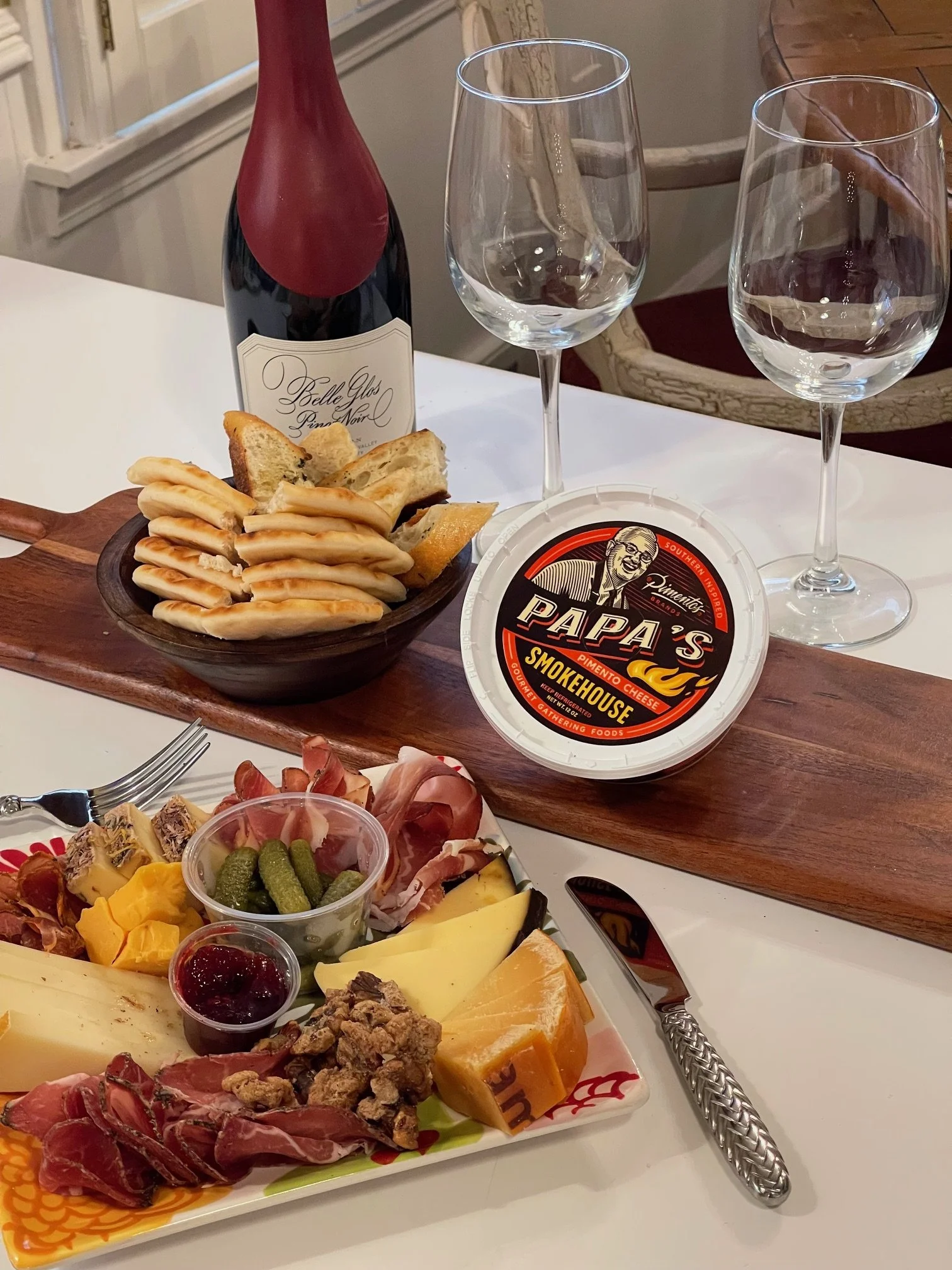 Enjoy your time with family and friends by hosting with Papa's Pimento Cheese - served along side with a charcuterie plate with meats and cheeses