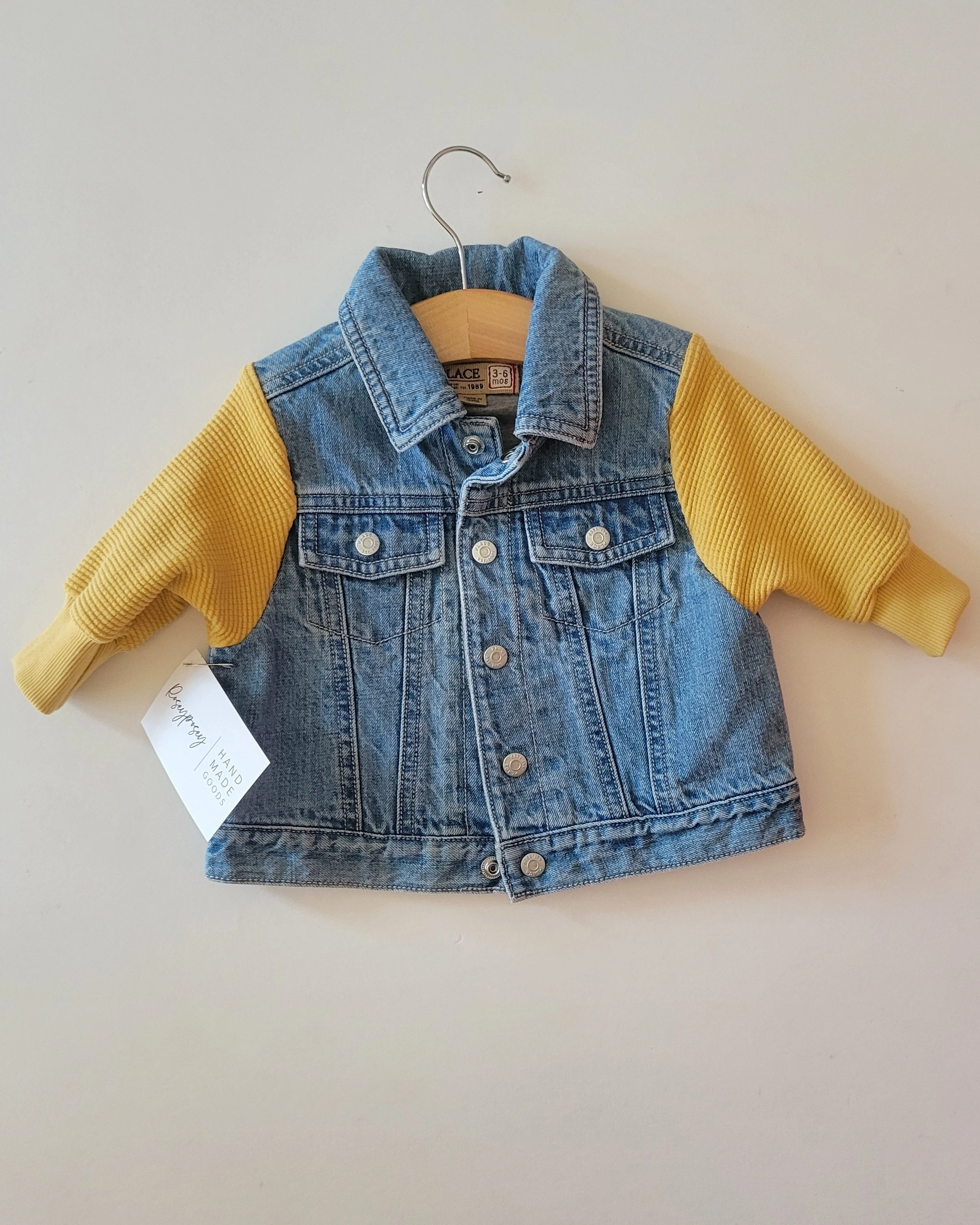 3-6m upcycled jean jacket with golden sleeves