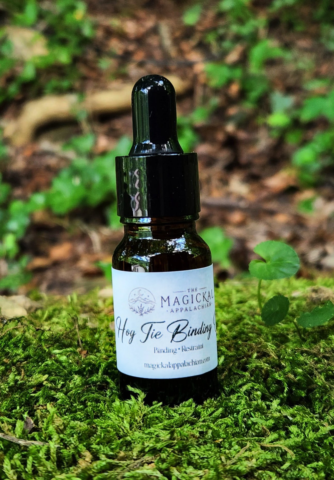A strong binding and restraint oil crafted for stopping harmful interference, gossip, unwanted influence, and spiritual troublemaking.