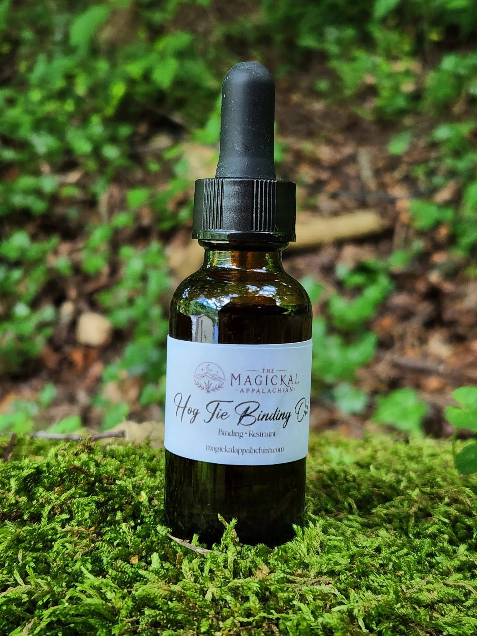 A strong binding and restraint oil crafted for stopping harmful interference, gossip, unwanted influence, and spiritual troublemaking.