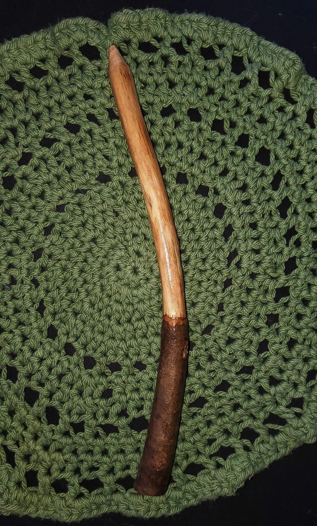 Wildwood Holler Wand #18, an Appalachian foraged wood ritual wand with a natural bark handle, smooth pale upper body, gentle curve, and pointed tip.