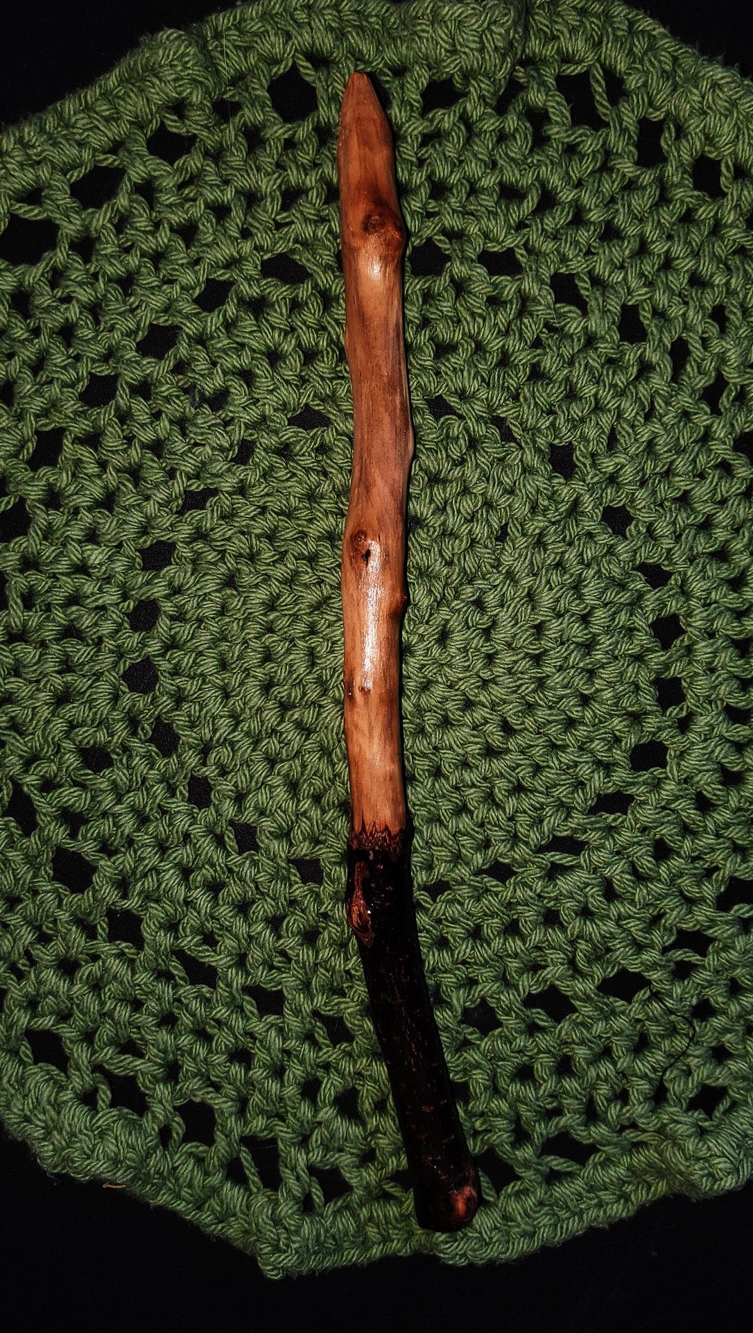 Wildwood Holler Wand #15, an Appalachian foraged wood ritual wand with a dark natural handle, warm polished upper body, gentle curve, and pointed tip.