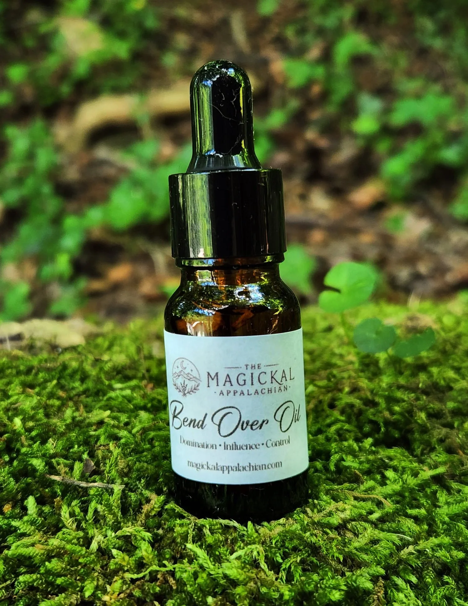 Bend Over Oil is a strong domination and influence ritual oil crafted for command work, authority, control, petitions, candles, and stubborn situations that need to bend.