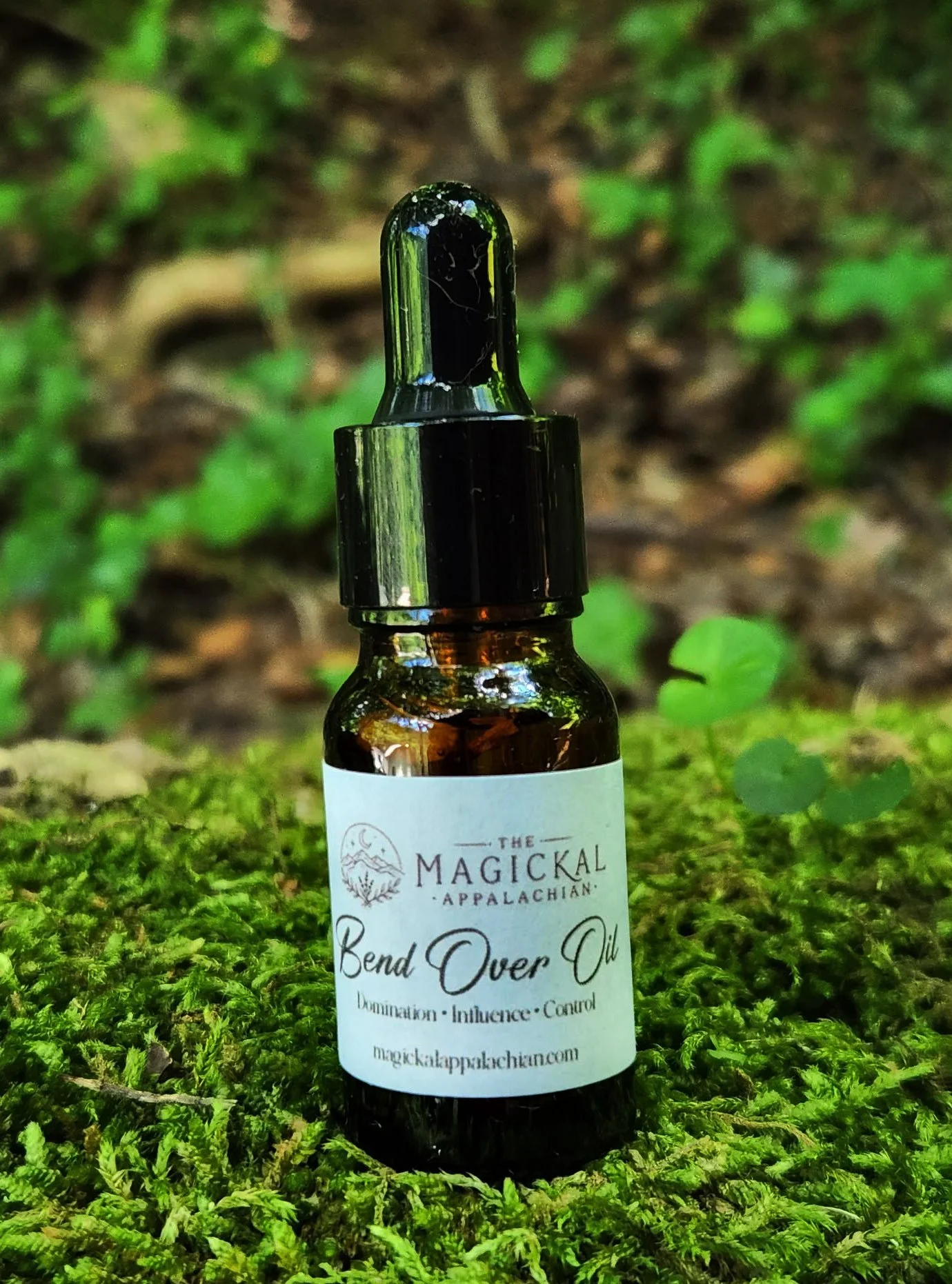 Bend Over Oil is a strong domination and influence ritual oil crafted for command work, authority, control, petitions, candles, and stubborn situations that need to bend.