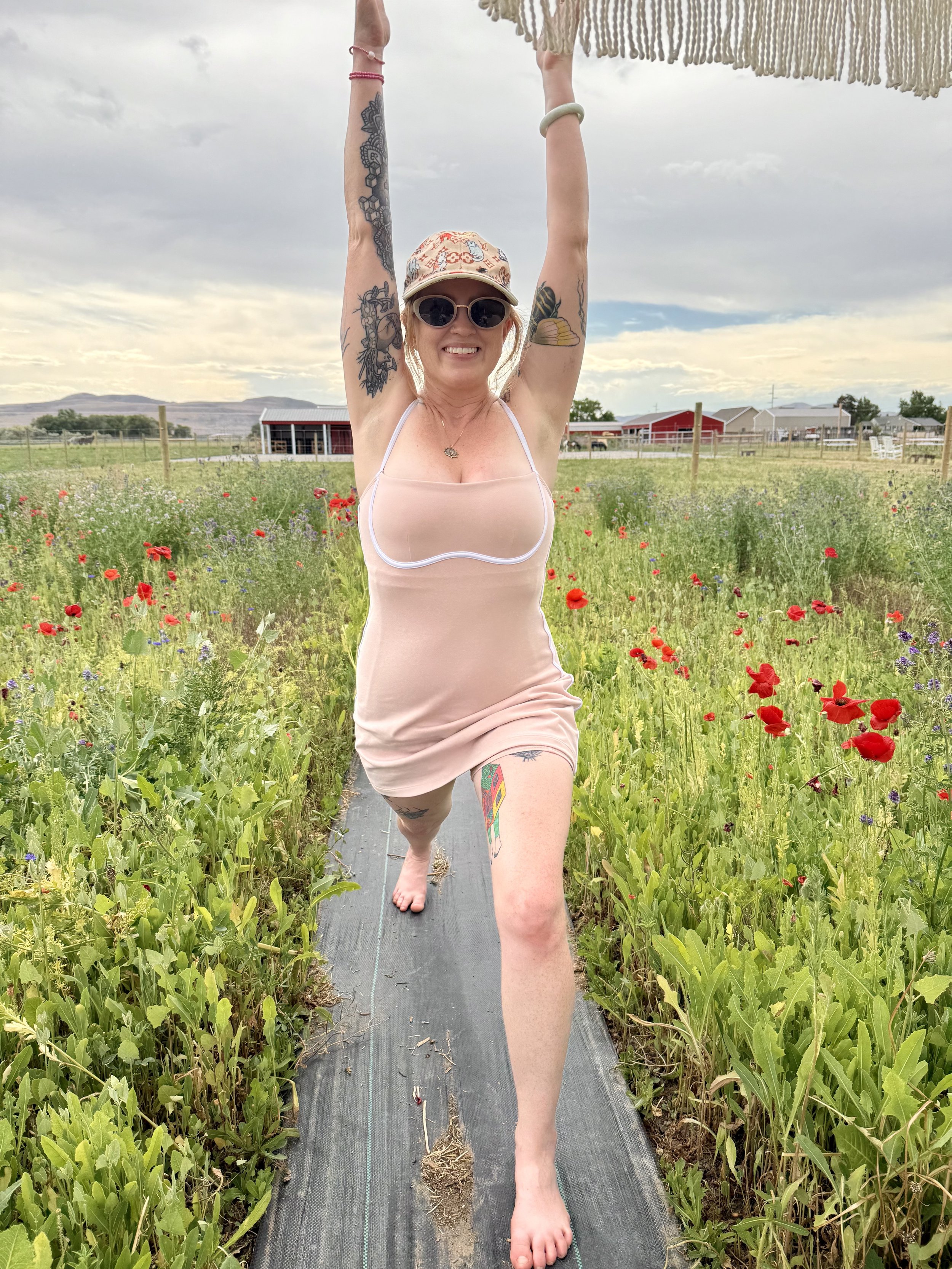 Yoga pose done in a flower field