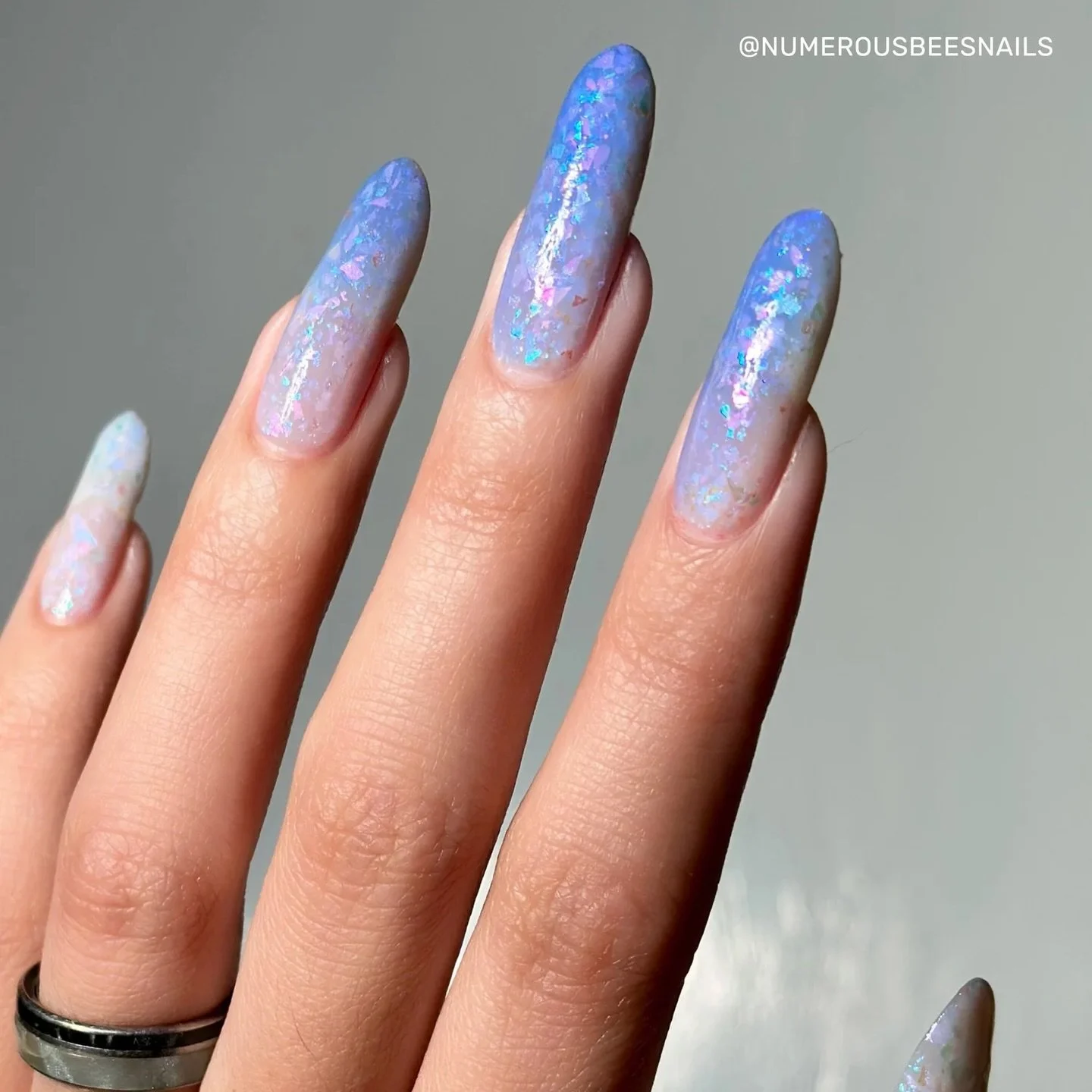 ETCHED IN LIGHT 
A crelly white to blue solar with pink, aqua, &amp; blue iridescent flakies &amp; dainty iridescent sparkle

Swatches by @numerousbeesnails @eviltwinnails @lacqueredwallflower @i.havenails @tonyaispolished 
Paid PR

#fauvecosmetics #
