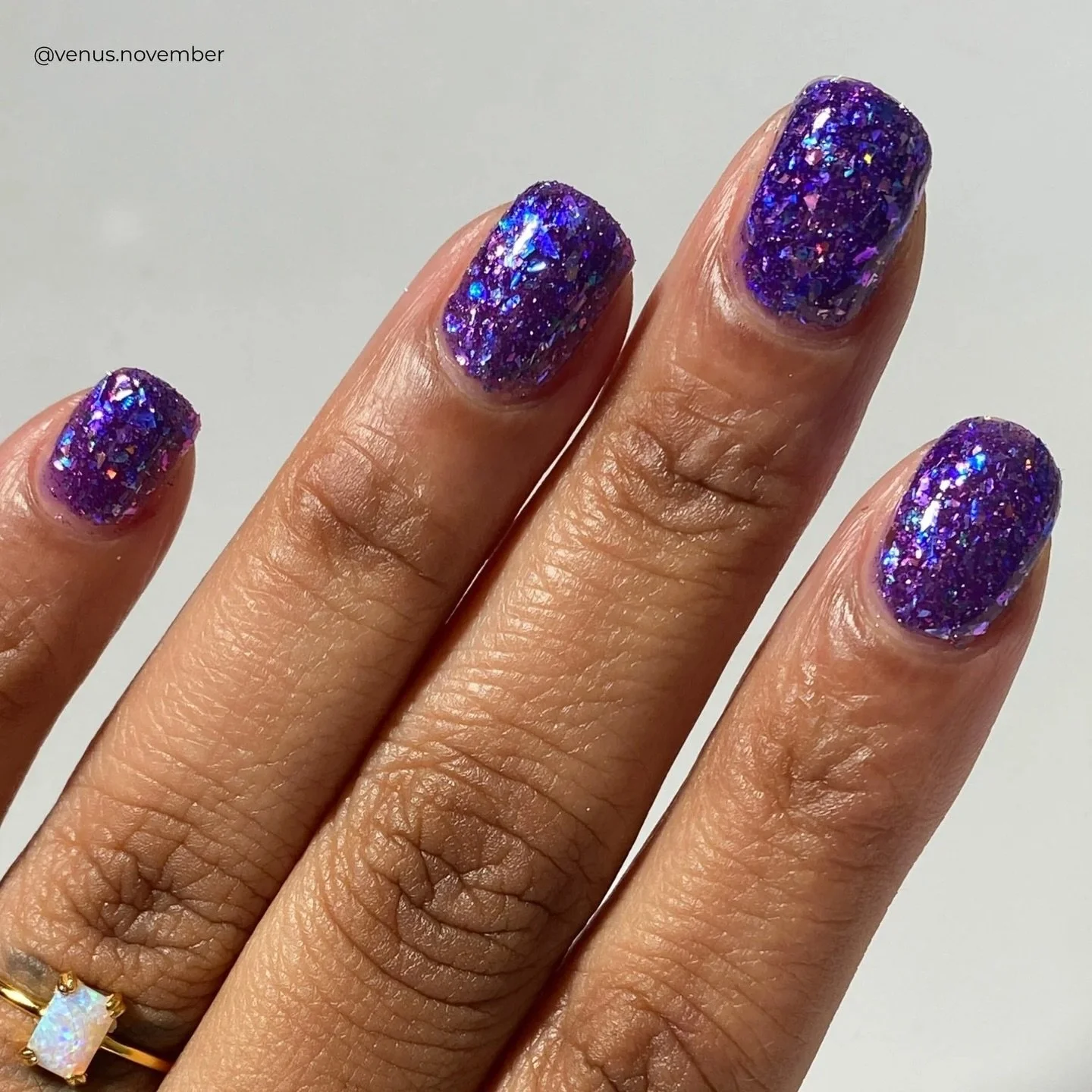 TWILIGHT BLOOMS
Purple jelly base, teal/purple &amp; blue/violet/purple color shifting flakies, violet holo micro shreds, denim blue and pink holo flakes, purple reflective glitter

Swatched by @venus.november 
Paid PR

#fauvecosmetics #nailpolish #g