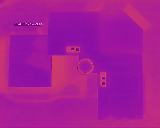 The same roof after repairs.  Notice there are no anomalies on the roof except where repairs were not requested (left section of the structure).