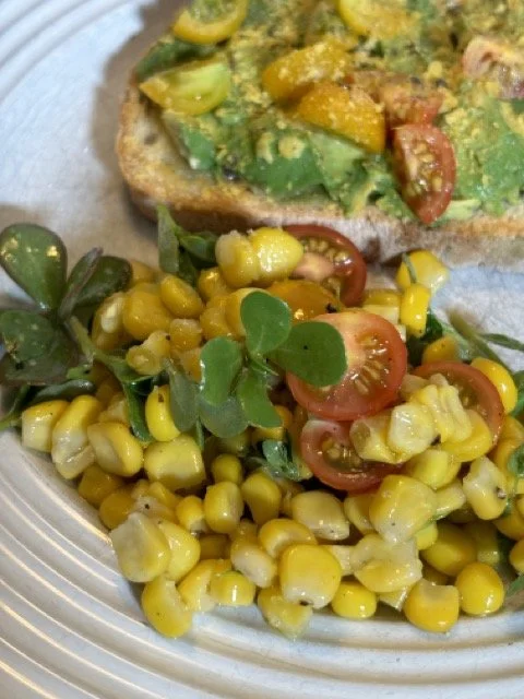 Avocado Toast on Aglio Bread with roasted corn and Purslane