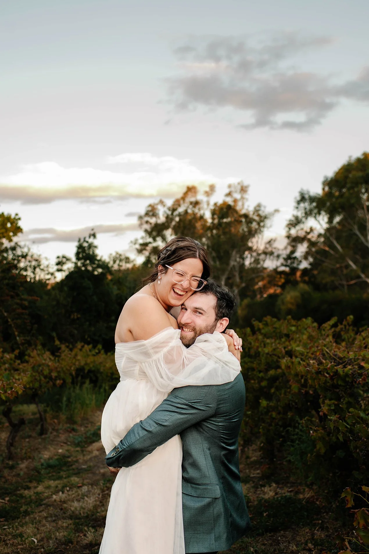 bride-groom-lift-laughs-vines-bendigo.jpg