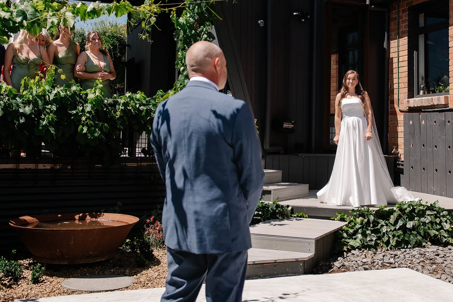Brides father turns around to see his daughter in wedding dress at first look