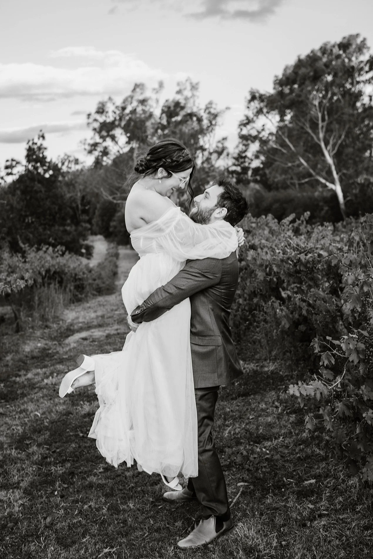 black-white-lift-bride-vines-chateau-dore-bendigo.jpg