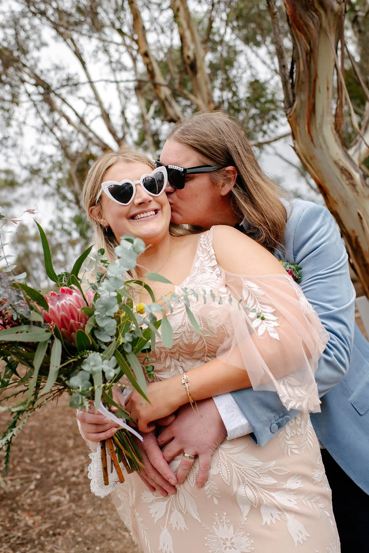 melbournes-best-wedding-photographer-sunnystones-cheeck-kiss.jpg