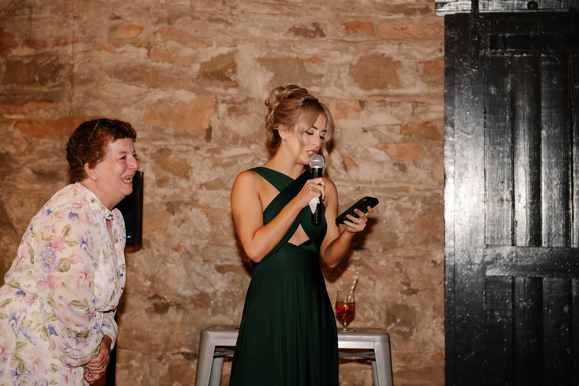 speeches at wedding reception in Chateau Dore in Bendigo with mother of the bride laughing behind