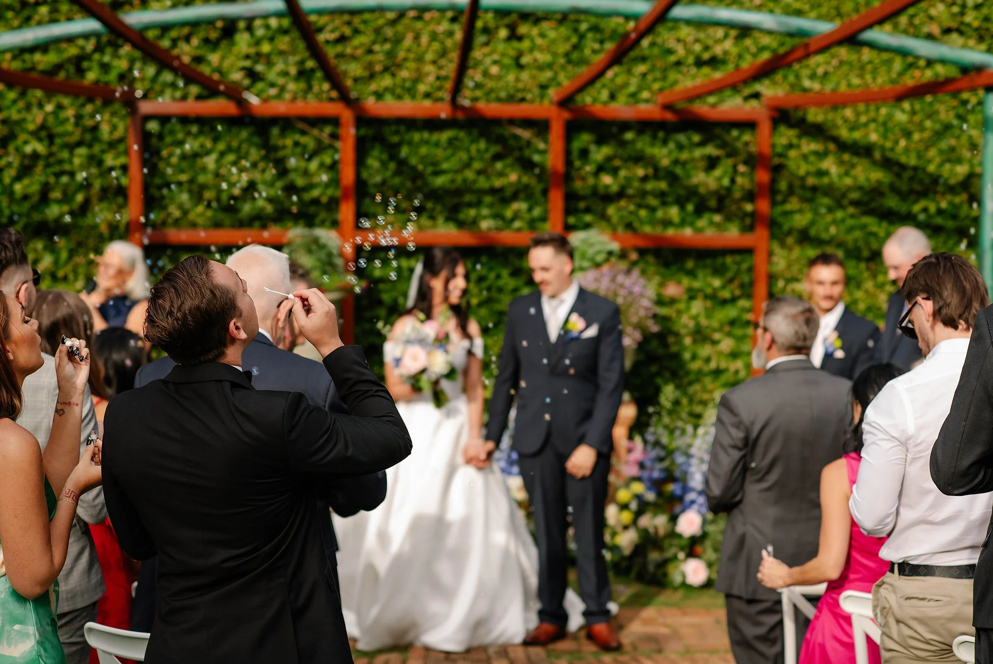 guest-bubbles-blurred-ceremony-background-olinda.jpg