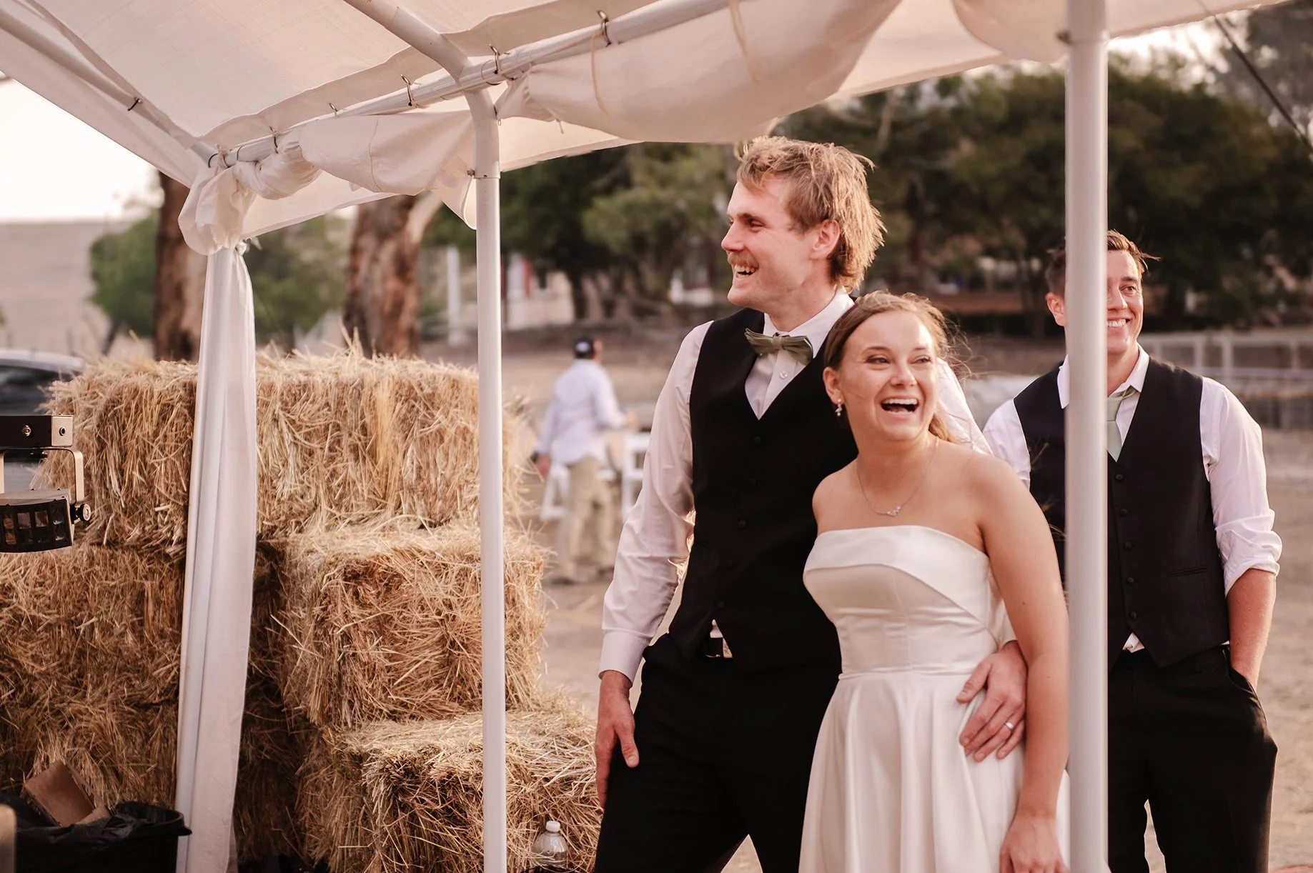 ballarat-couple-laugh-watch-speeches.jpg