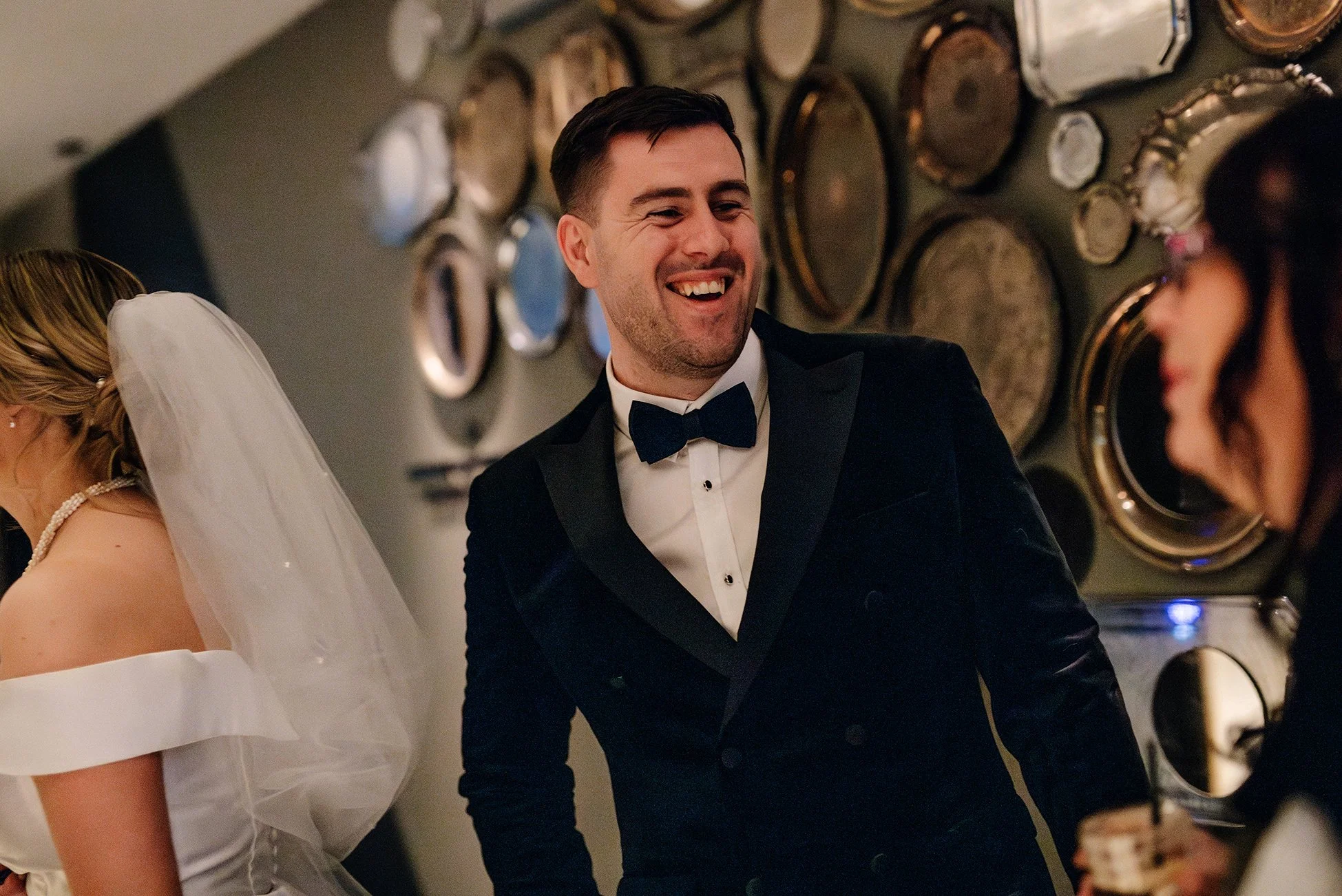 groom-laughs-guest-reception-melbourne.jpg