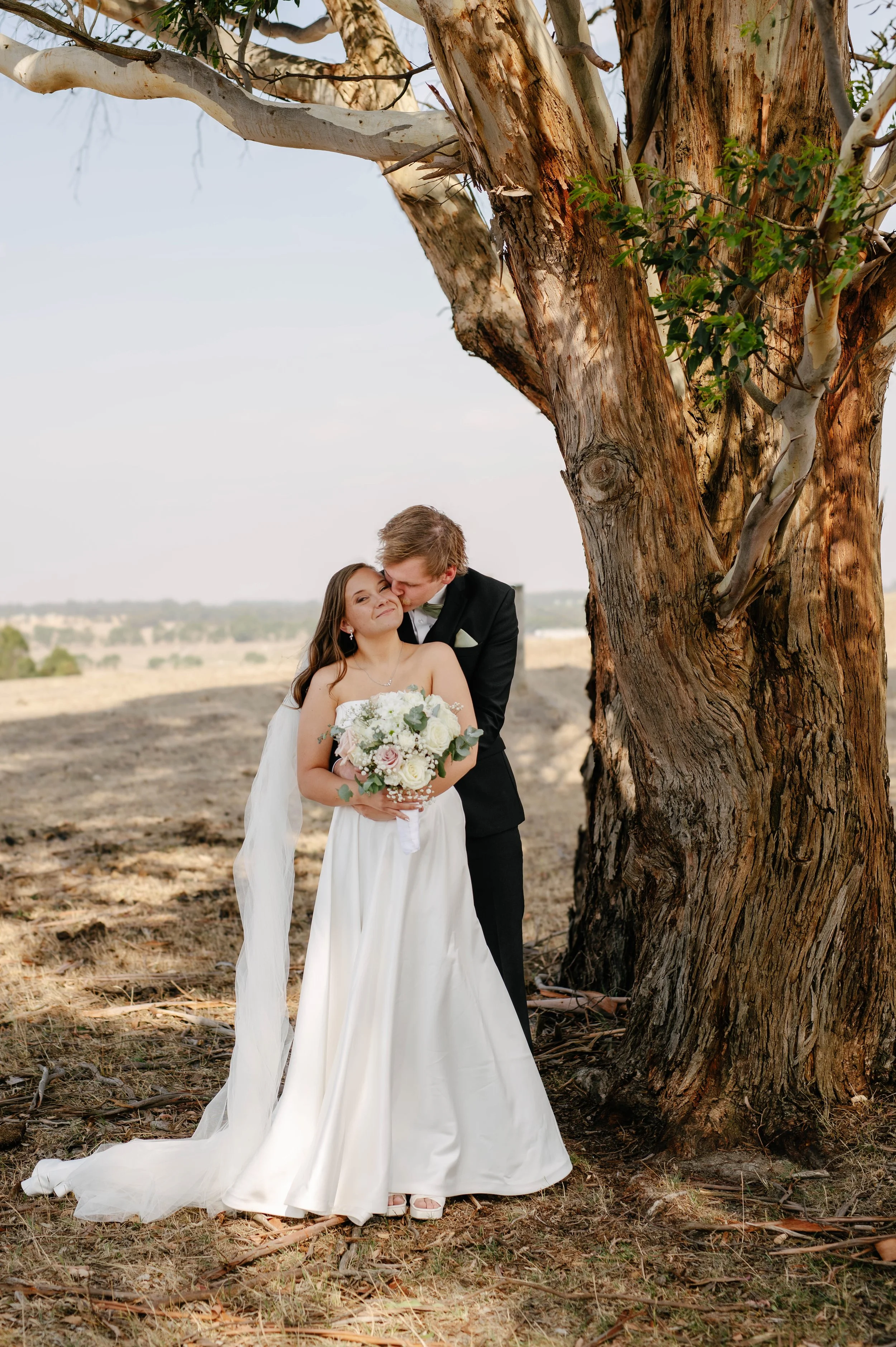 ballarat-kiss-bride-on-cheek-tree.jpg