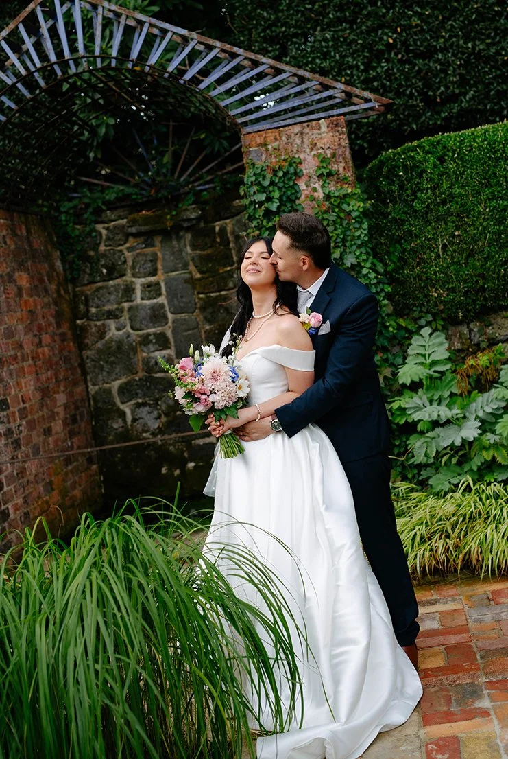 couple-water-feature-cheek-kiss-cloudehill-olinda.jpg