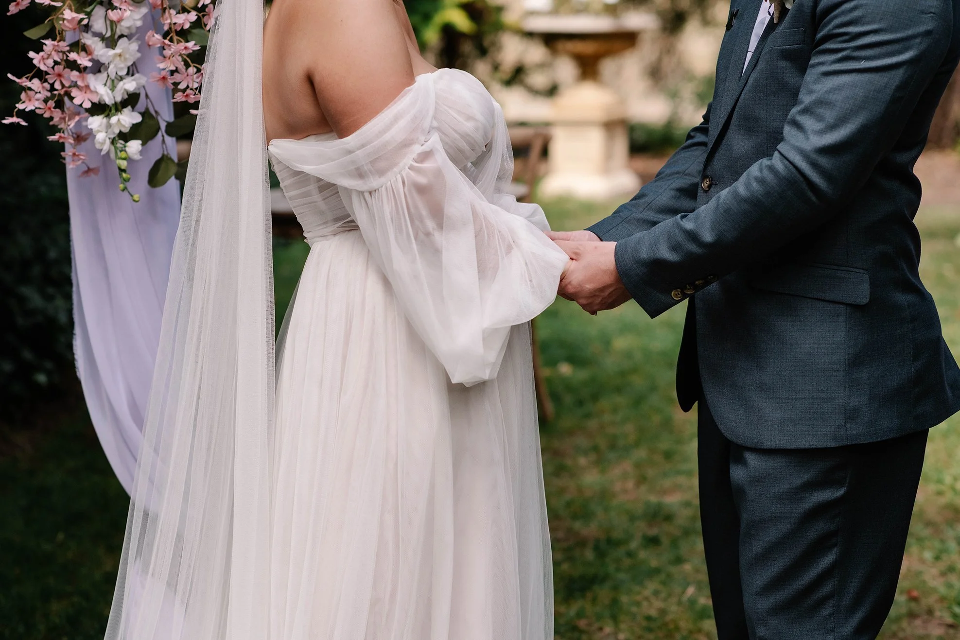 close up of bride and groom holding hands in Bendigo