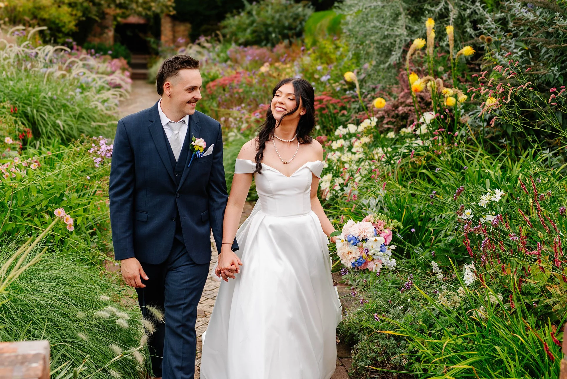 bride-head-toss-big-garden-walk-cloudehill-gardens.jpg