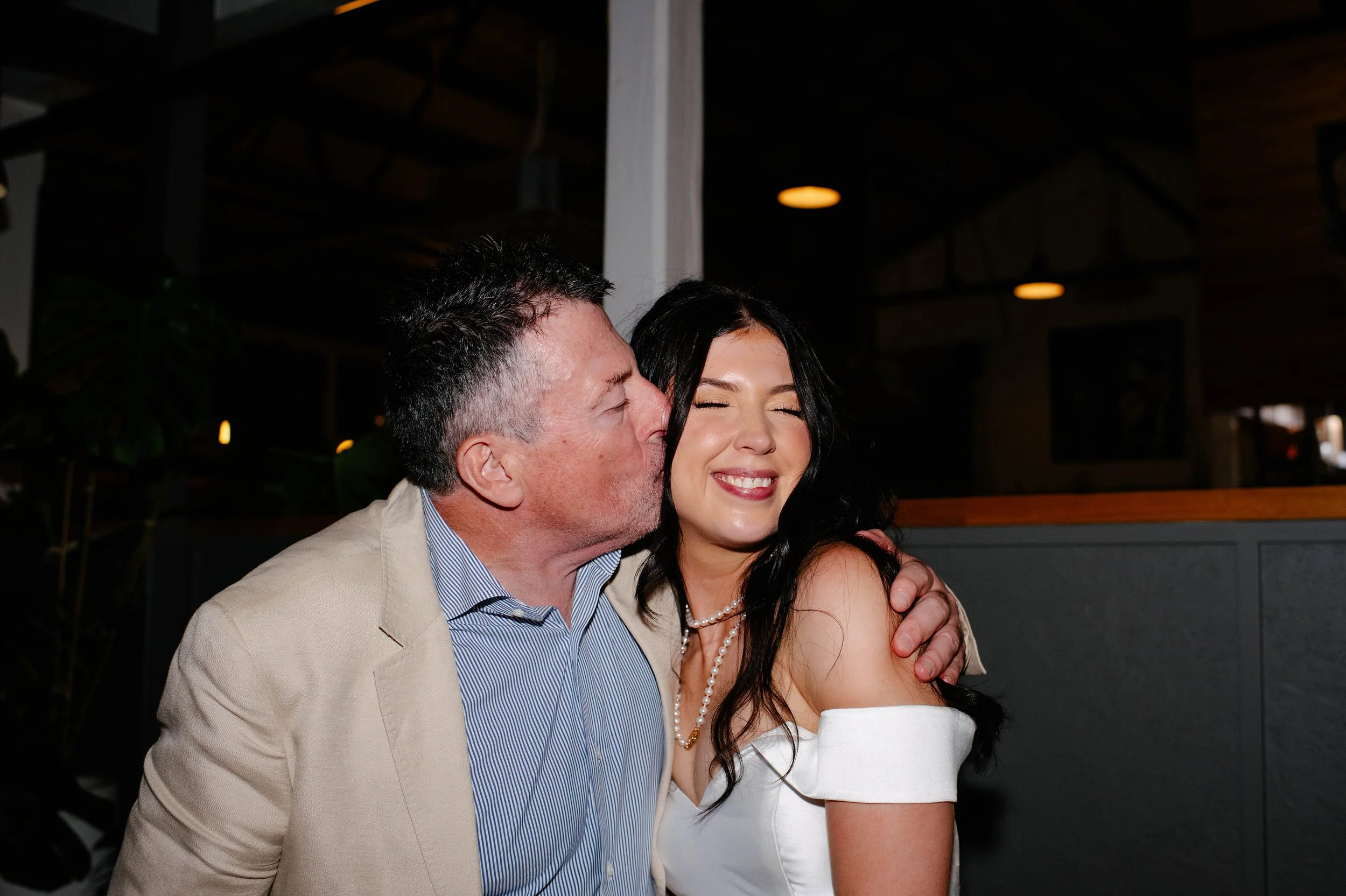 reception-man-kiss-bride-independent-gembrook.jpg