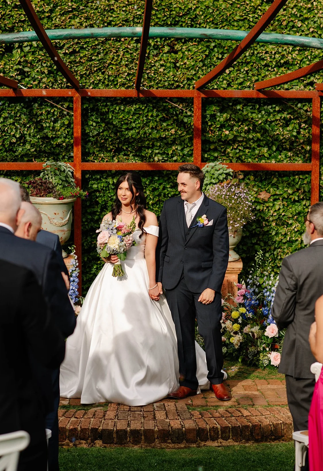 bride-groom-together-hold-hands-olinda-wedding.jpg