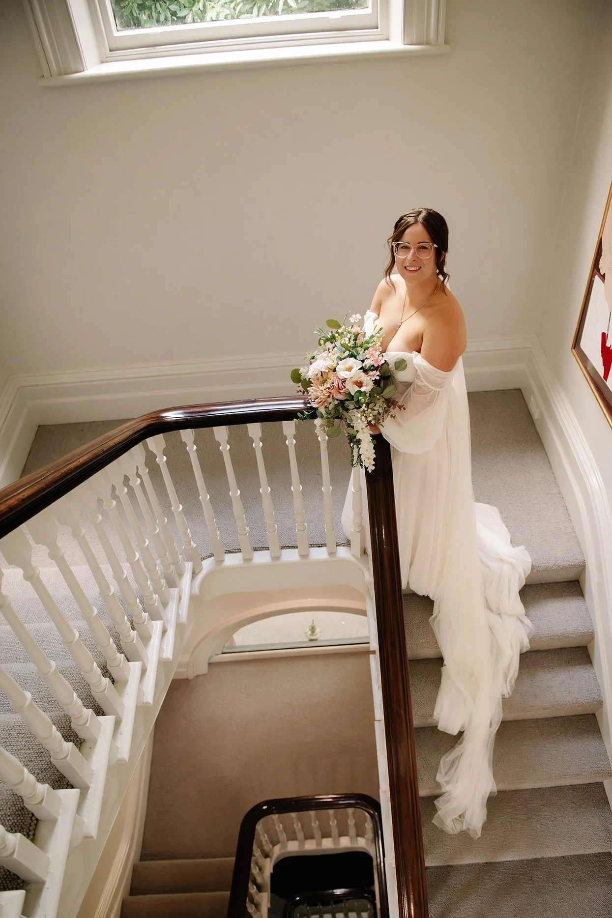 bride-on-stairs-hotel-bendigo-smiles.jpg