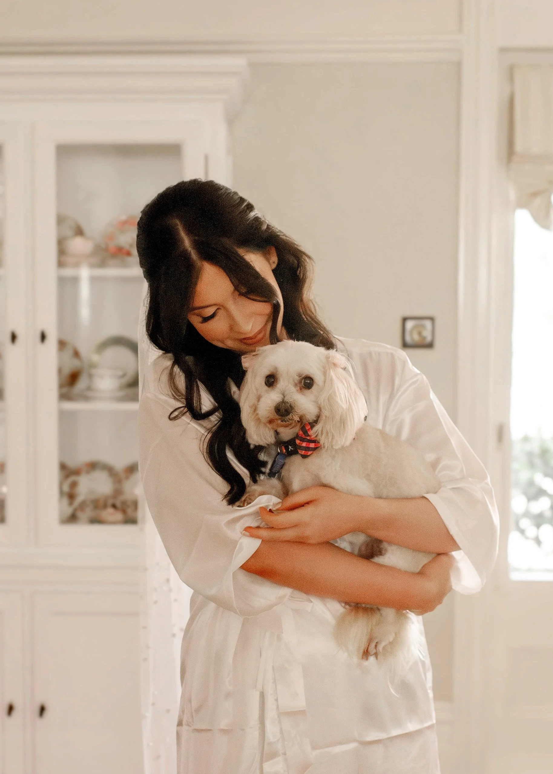 bride-holds-dog-before-wedding-olinda.jpg