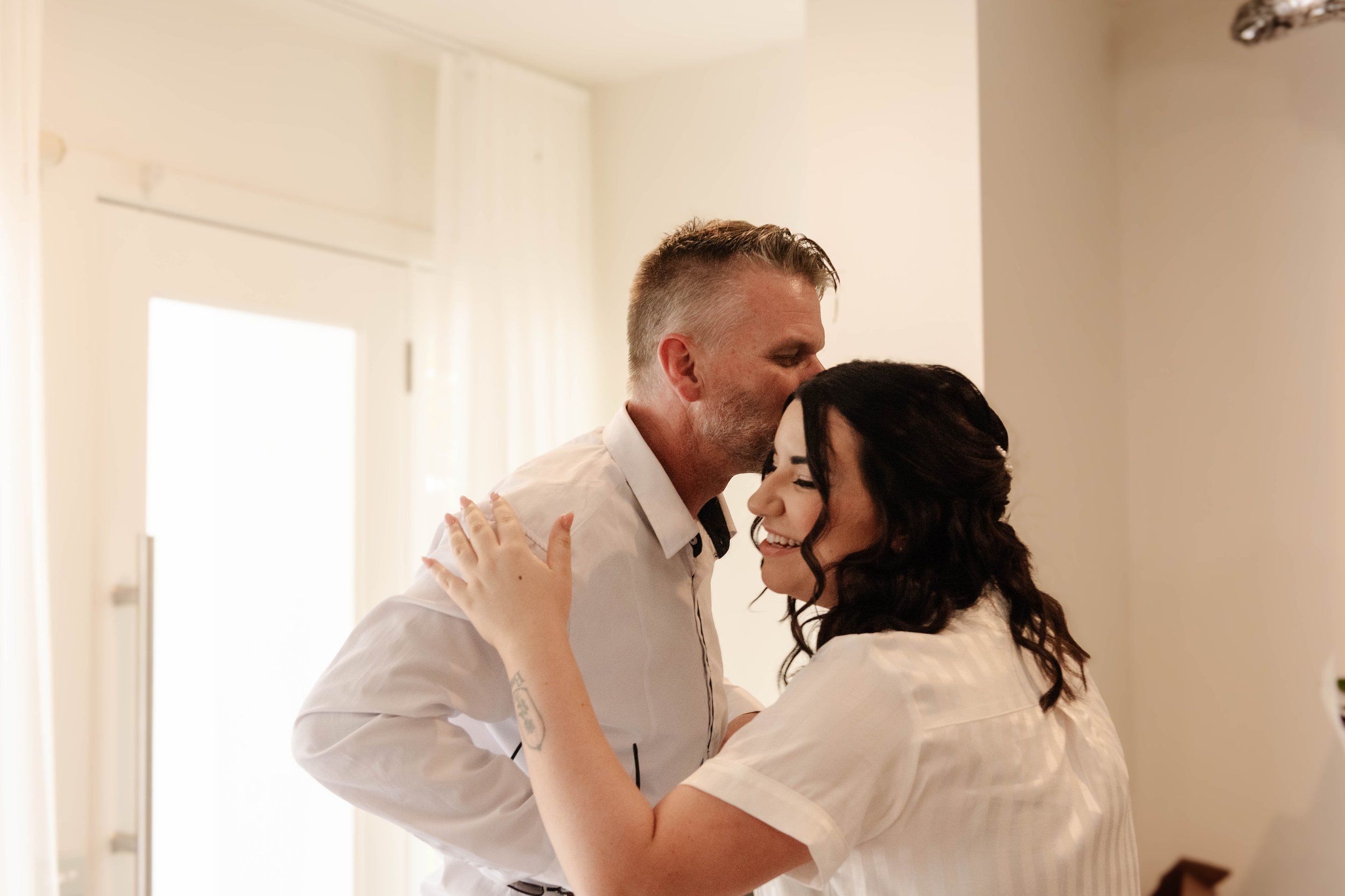 getting-ready-dad-kisses-bride-dromana.jpg