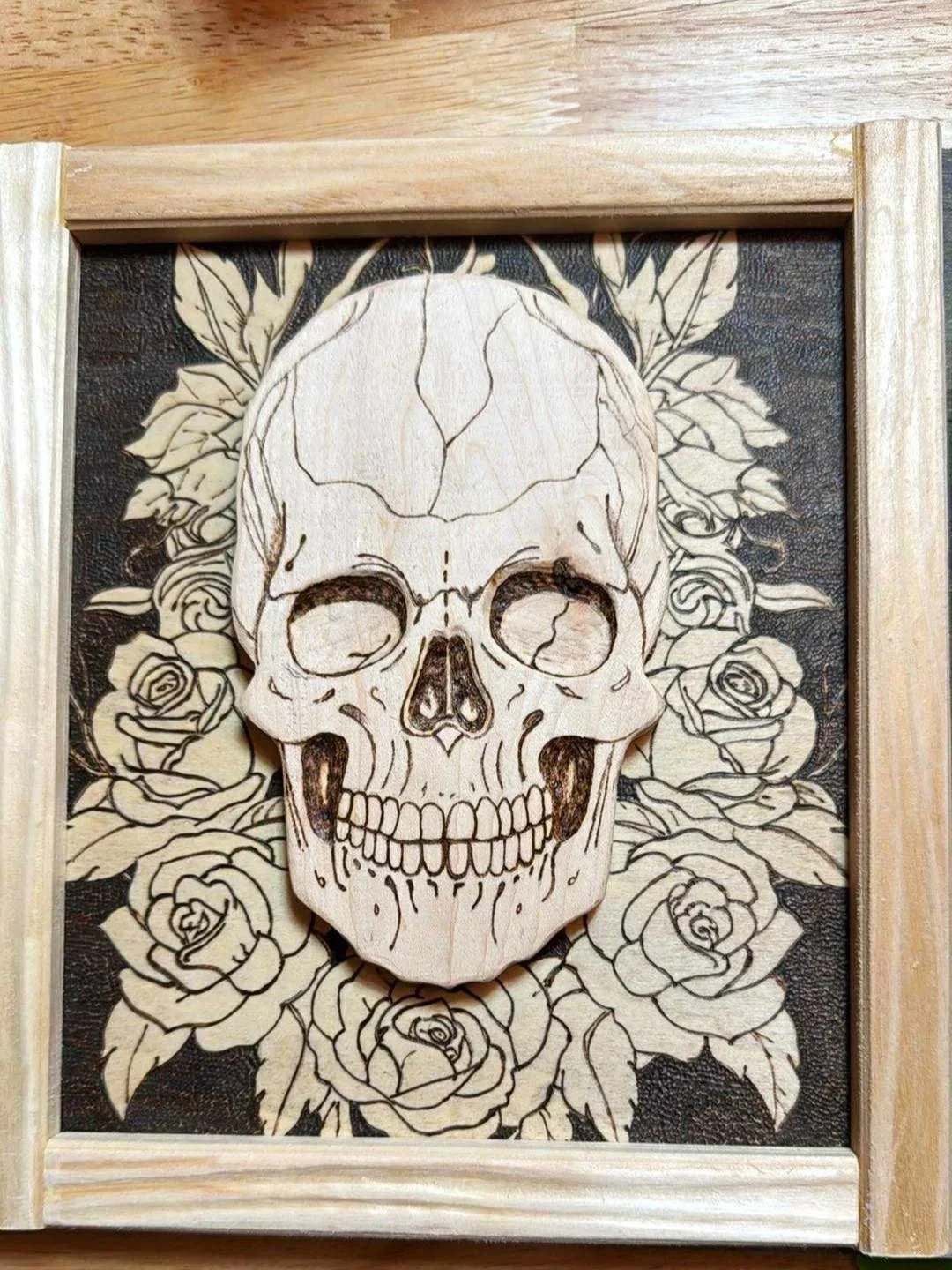 skull+and+roses+sculpted+and+woodburned.jpg