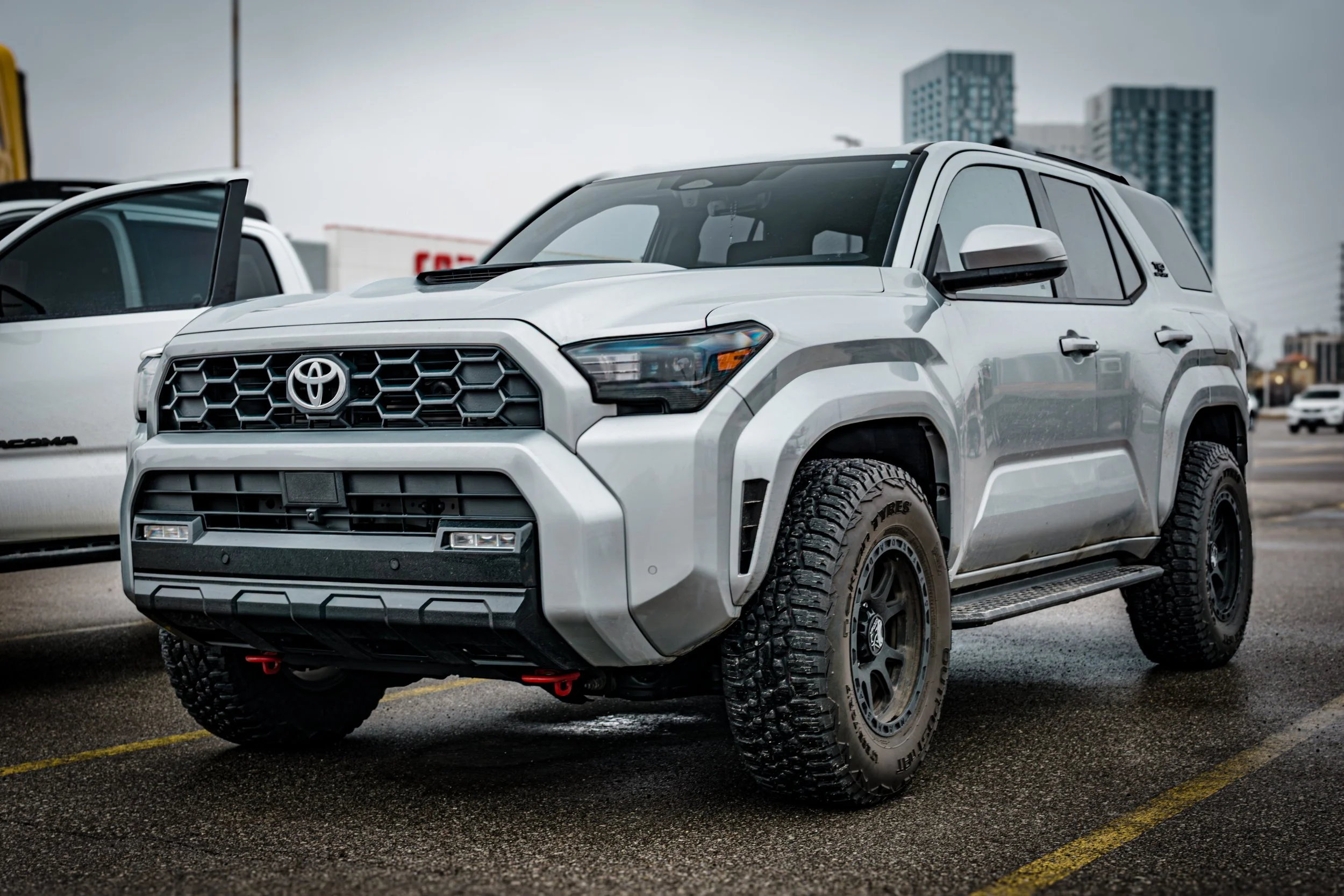Black Toyota Tacoma on a mountain trail