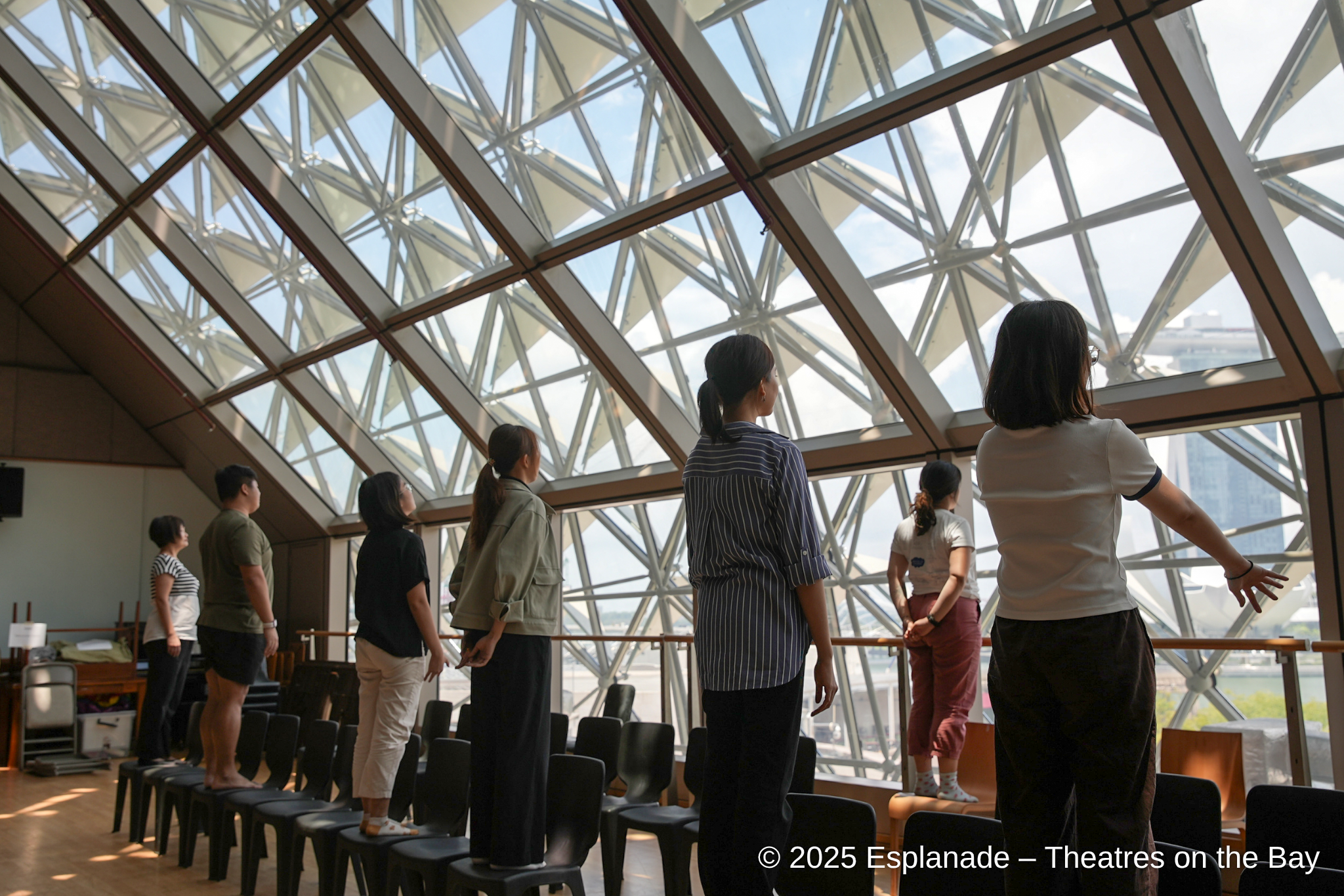 Participants taking part in experiential dance movement session at INTERMISSION 2025, a programme that supports the wellbeing of those in the arts. (Copy)