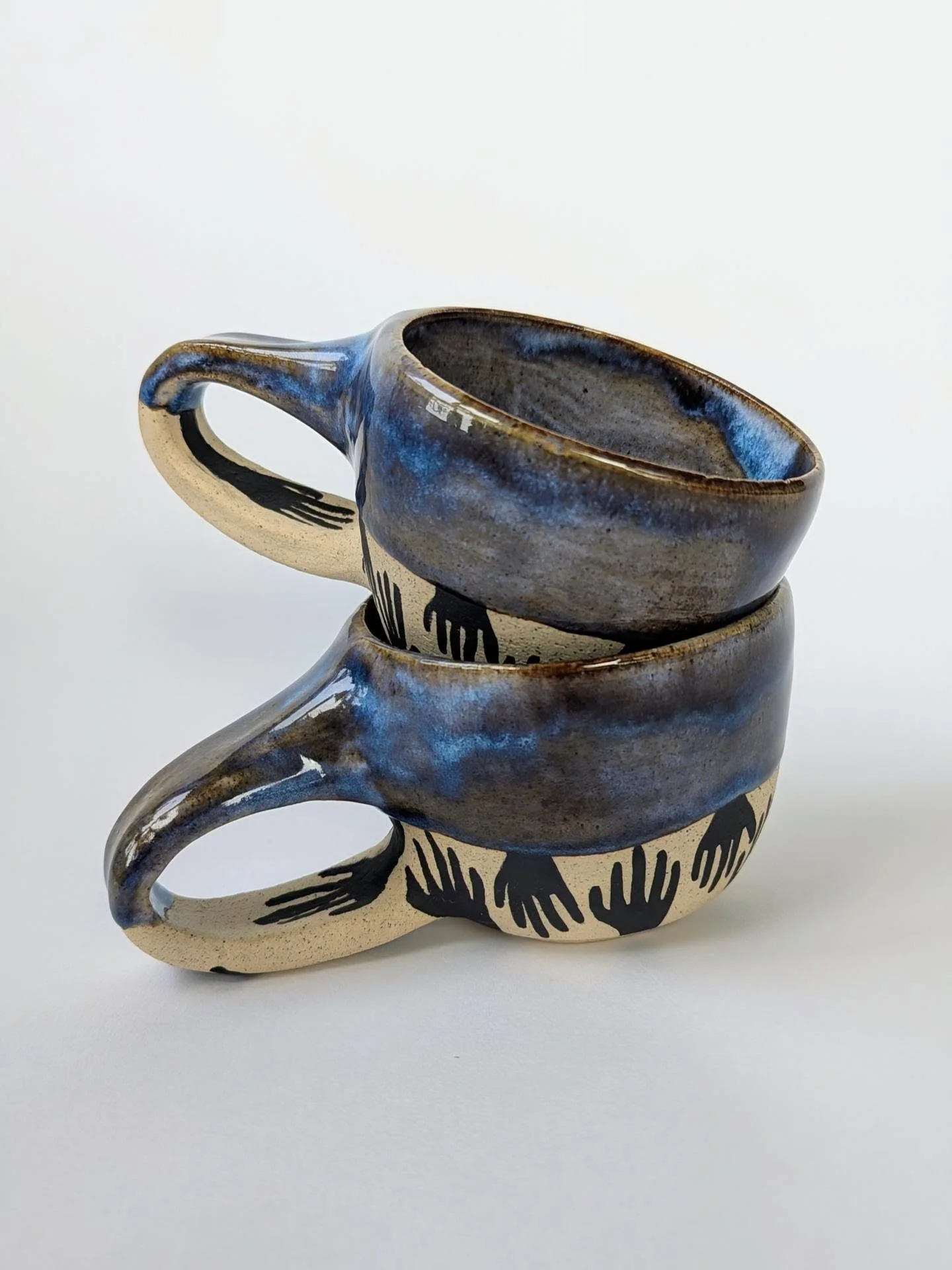 These little hands took aaaaaaages to paint and I'm trying to decide if it was worth the time lol. What do you think? 

#handset #underglaze #bluemountainsmakers #handmadecups