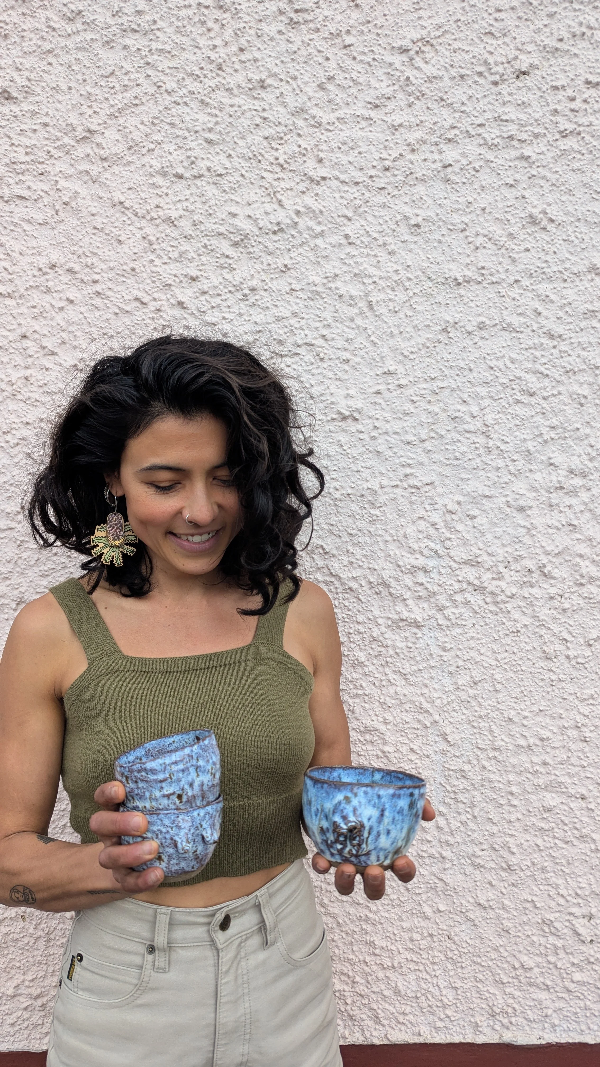 Claire smiling with her handmade vulva cups